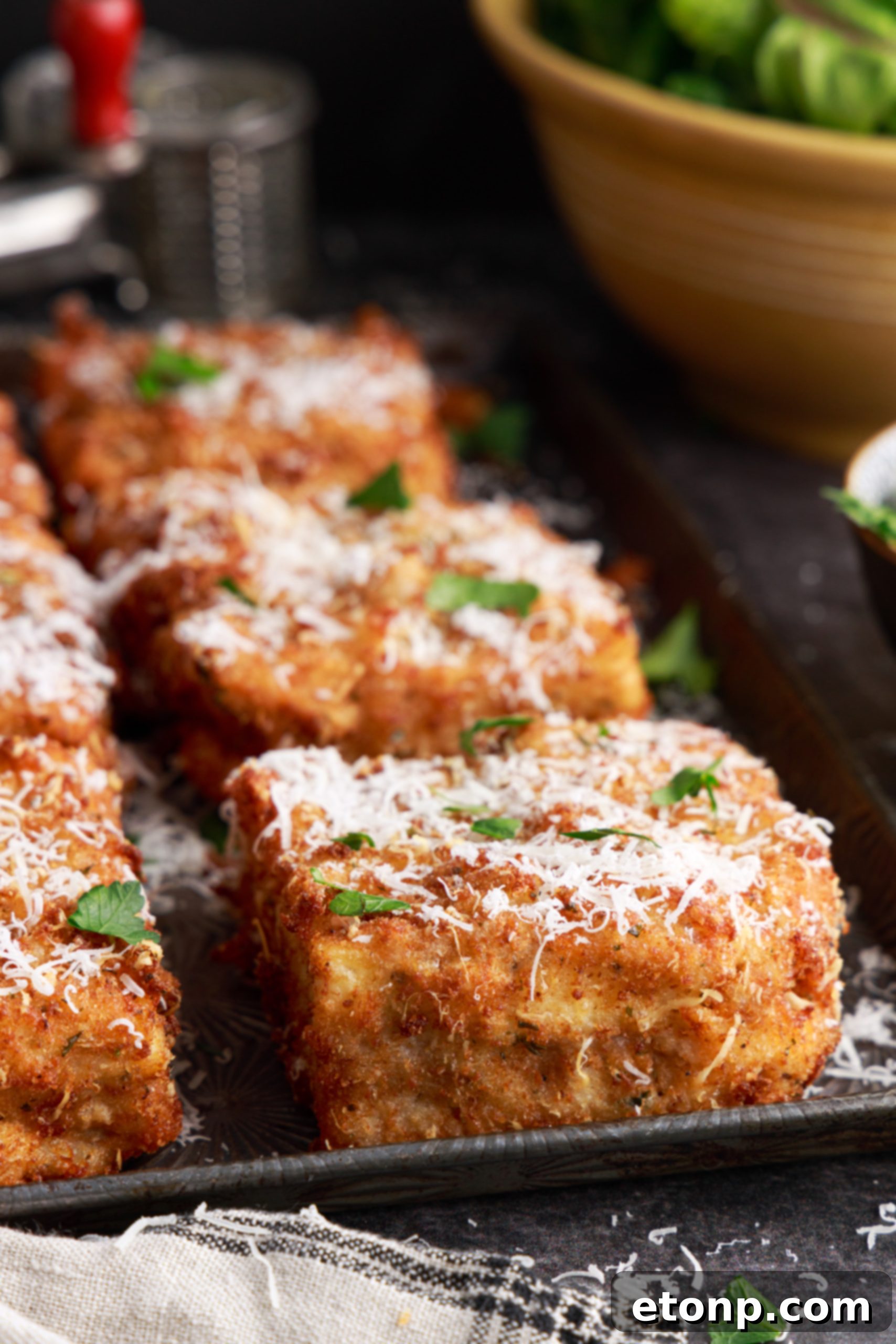 Golden-brown deep fried lasagna slices, perfectly crispy