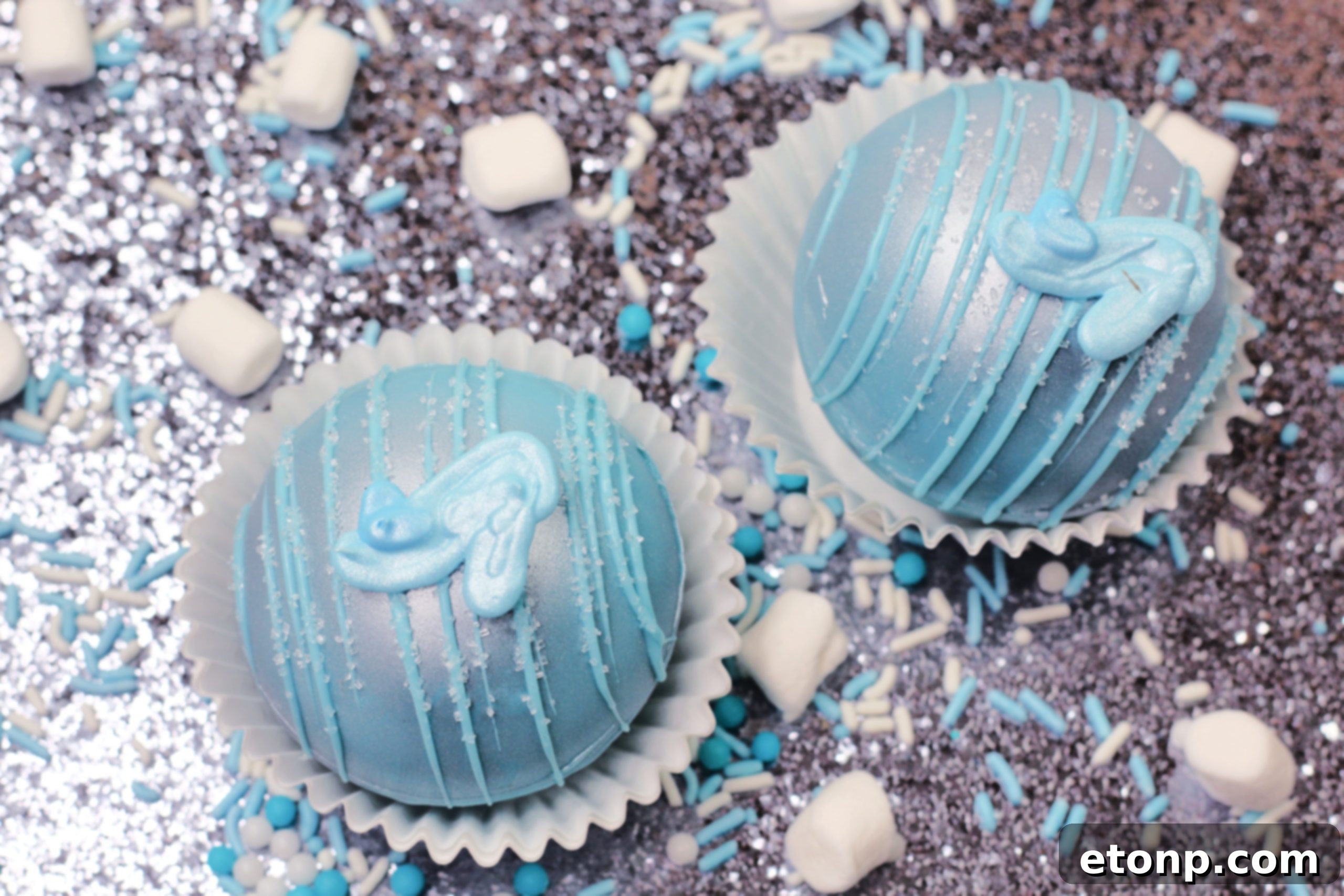 Cinderella Hot Cocoa Bombs arranged in a gift box, showcasing their beautiful blue color and intricate decorations, perfect for a princess-themed celebration.