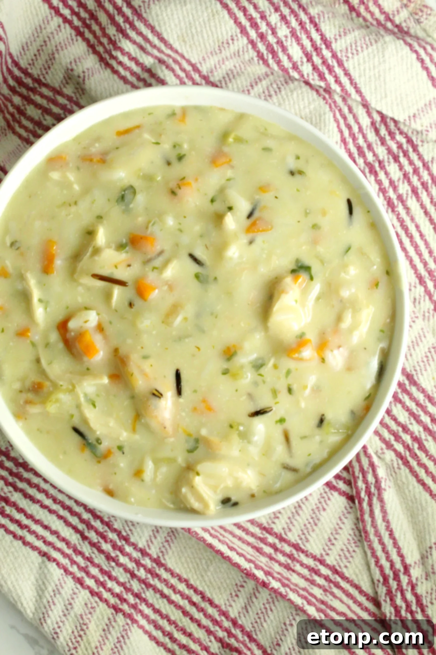 Shredded cooked chicken, a key protein ingredient for the rich Chicken & Wild Rice Soup.