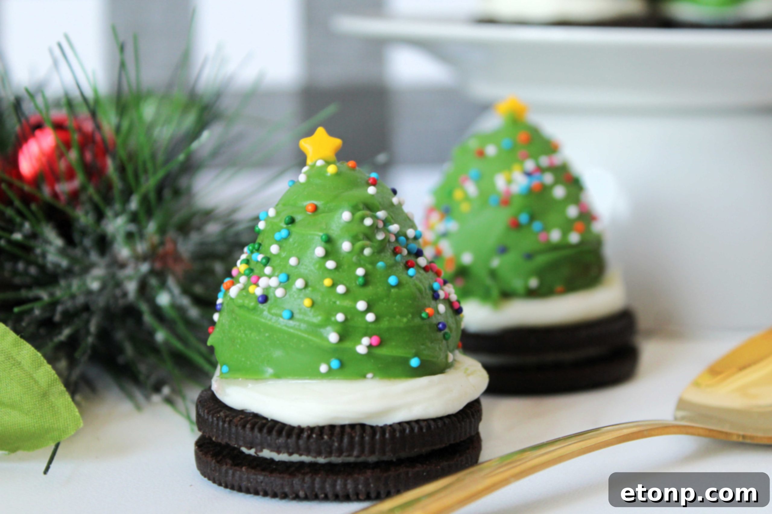 Festive Chocolate Covered Strawberry Christmas Trees on a white platter