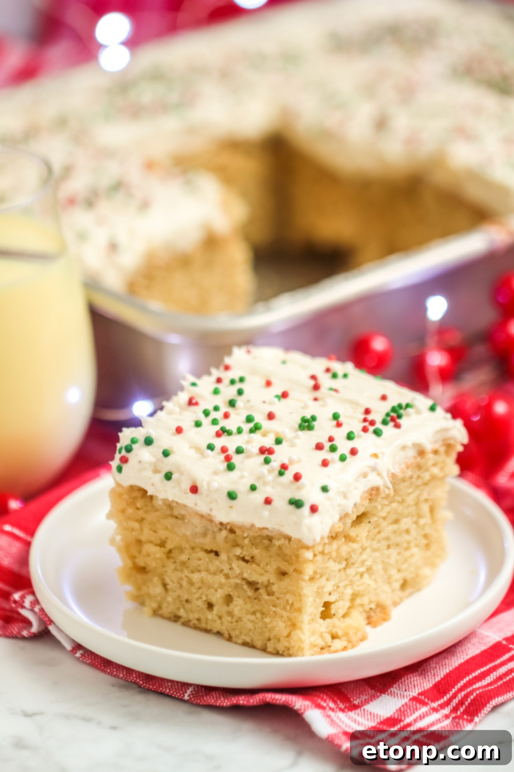 Holiday Eggnog Sheet Cake Delight 9 A close-up shot of the perfectly frosted Eggnog Sheet Cake, highlighting the texture and decoration.