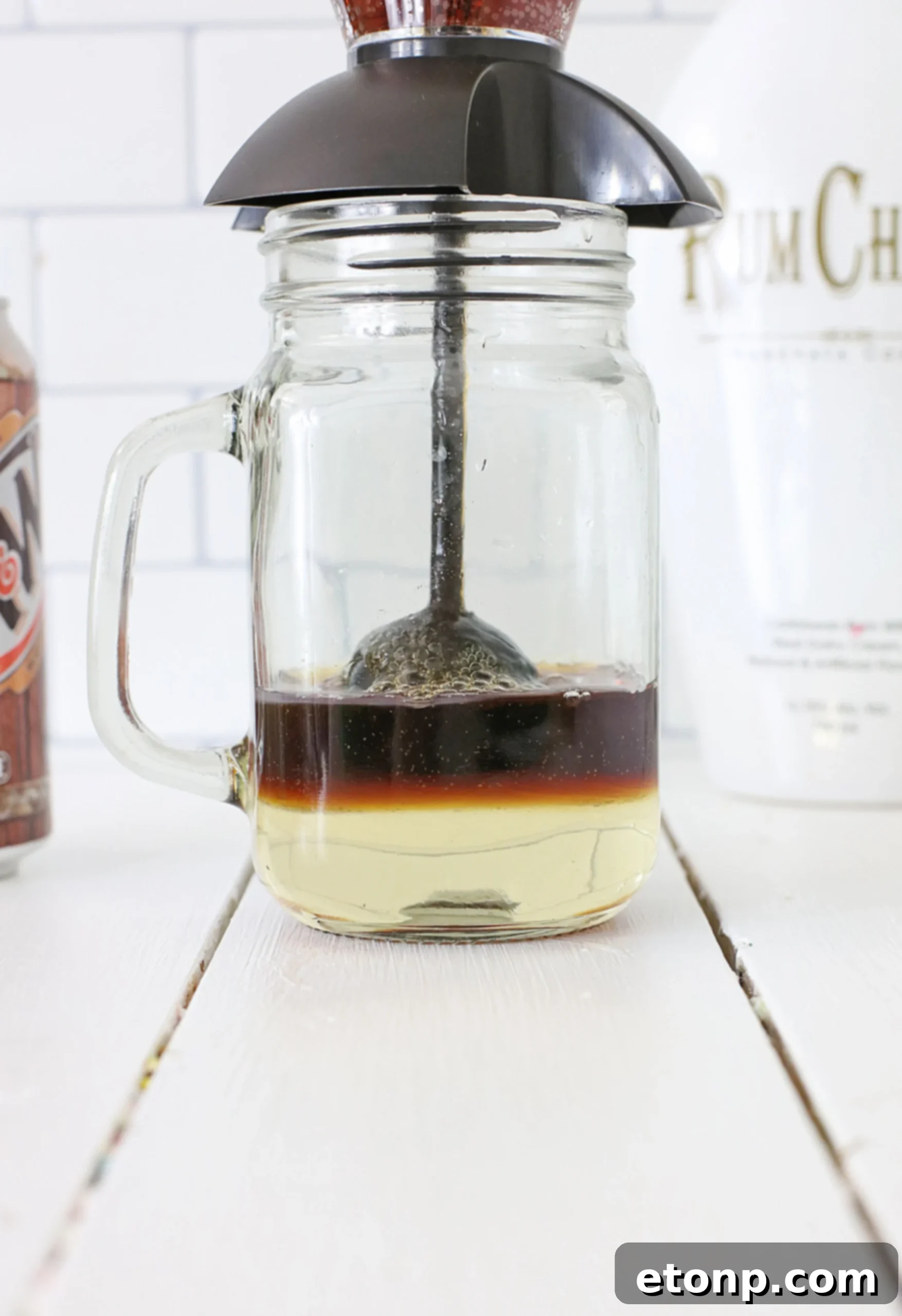 Decadent Layered Root Beer Float Cocktail 3 Close-up shot of the Layered Root Beer Float Cocktail, showcasing its beautiful layers.