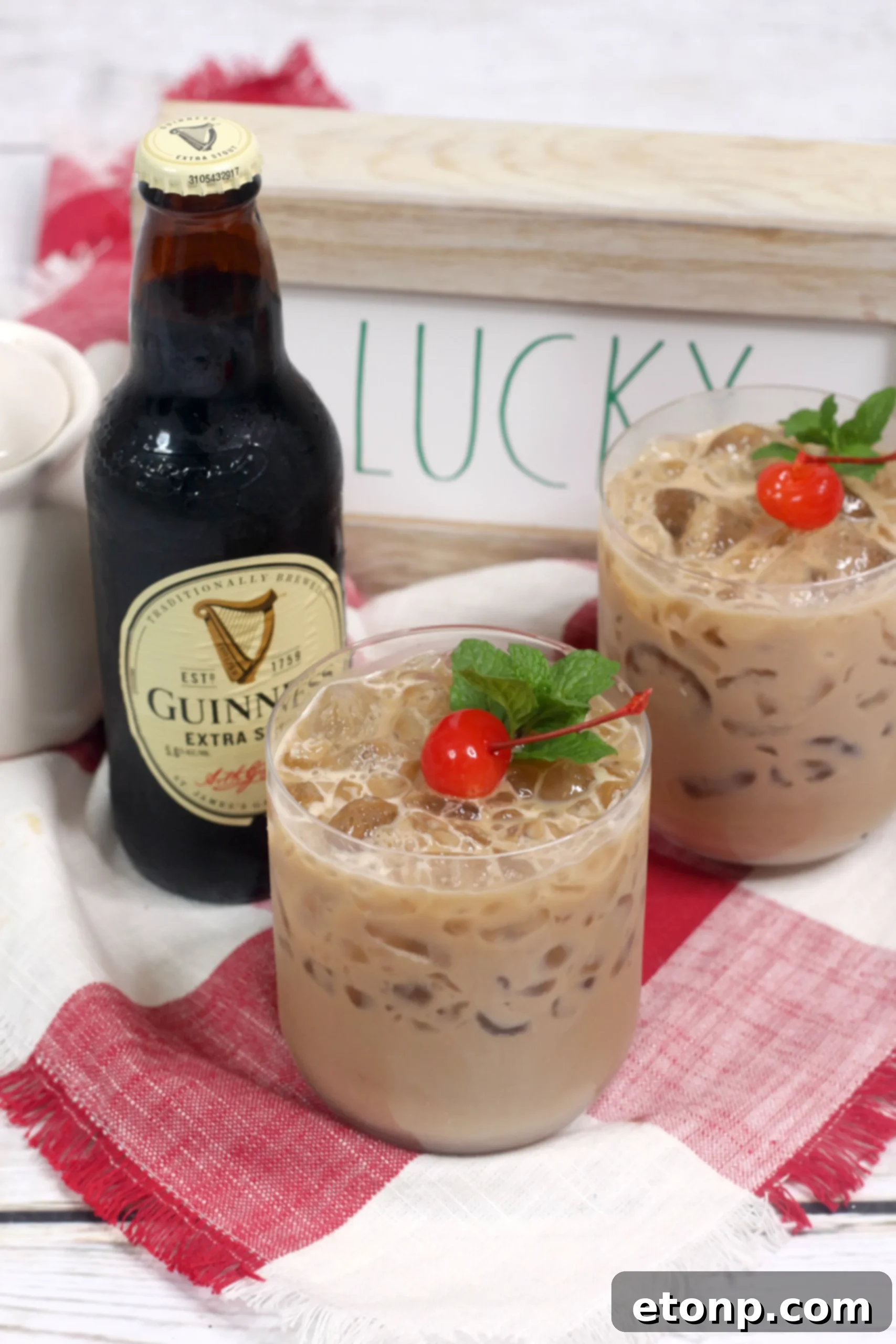 Five glasses of Baileys Irish Cream McGregor Cocktail arranged beautifully, ready for serving at a festive event.