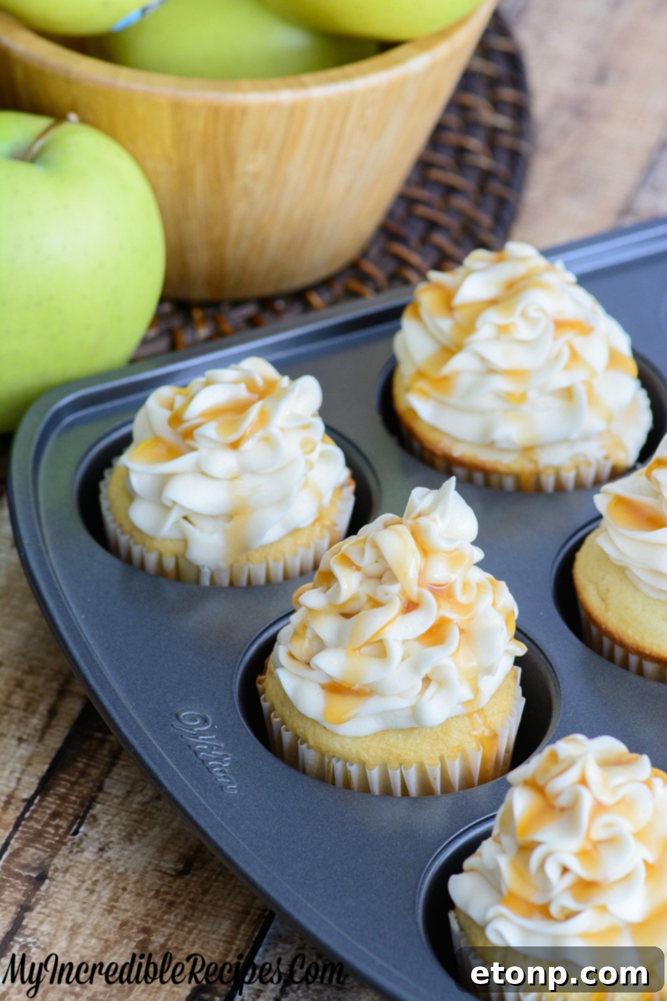 Close-up of freshly baked Caramel Apple Cupcakes ready for frosting