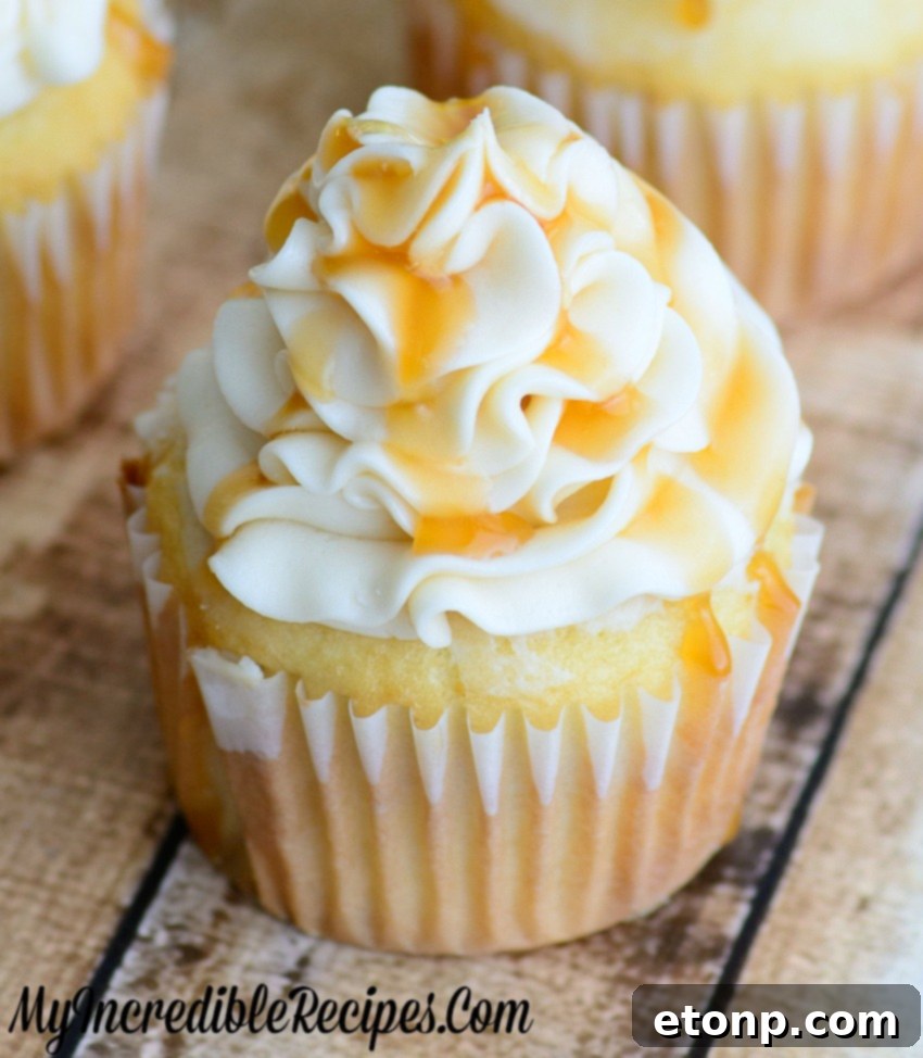 Unfrosted Caramel Apple Cupcakes in a muffin tin