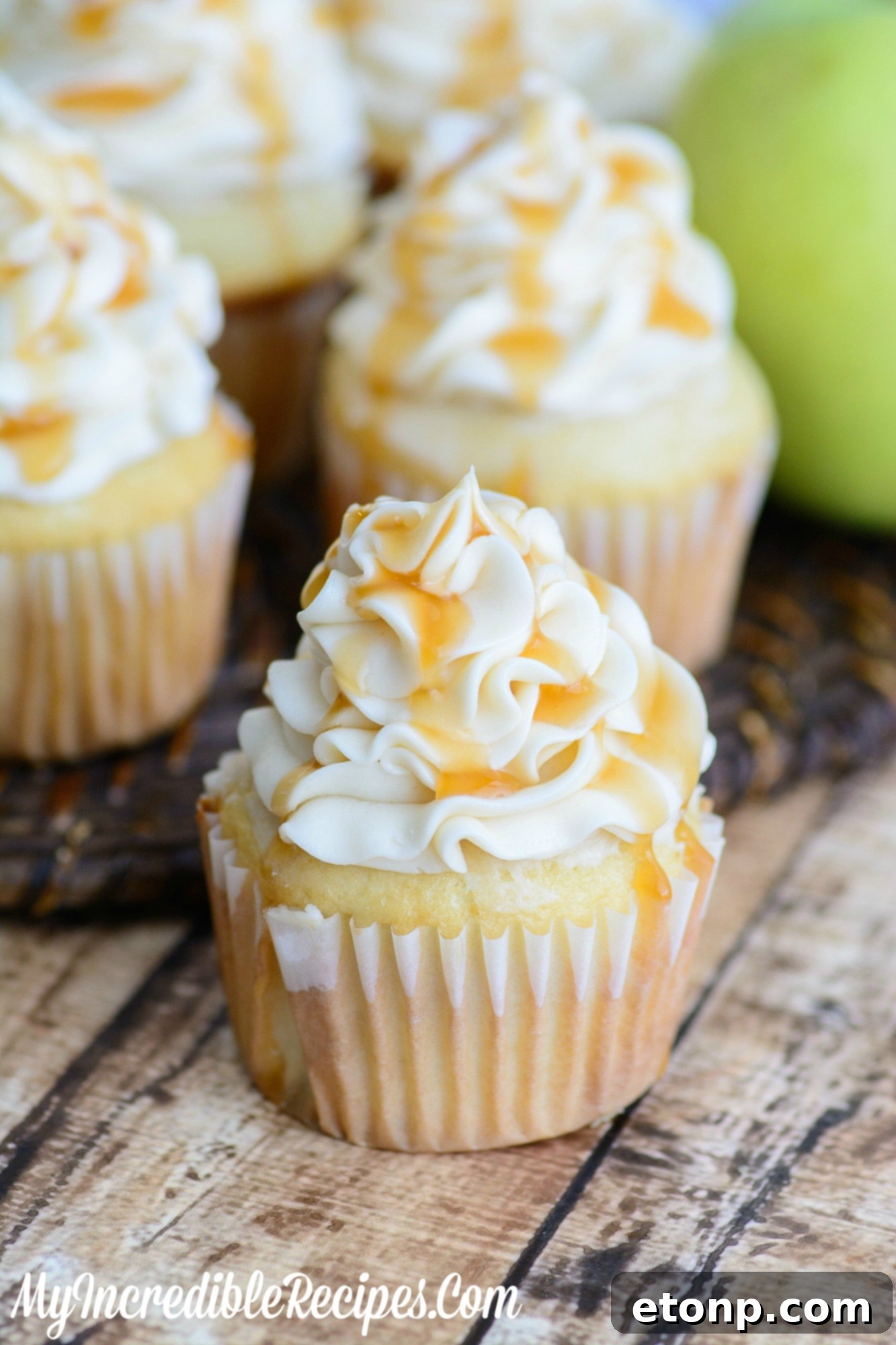 A cluster of Caramel Apple Cupcakes arranged artfully