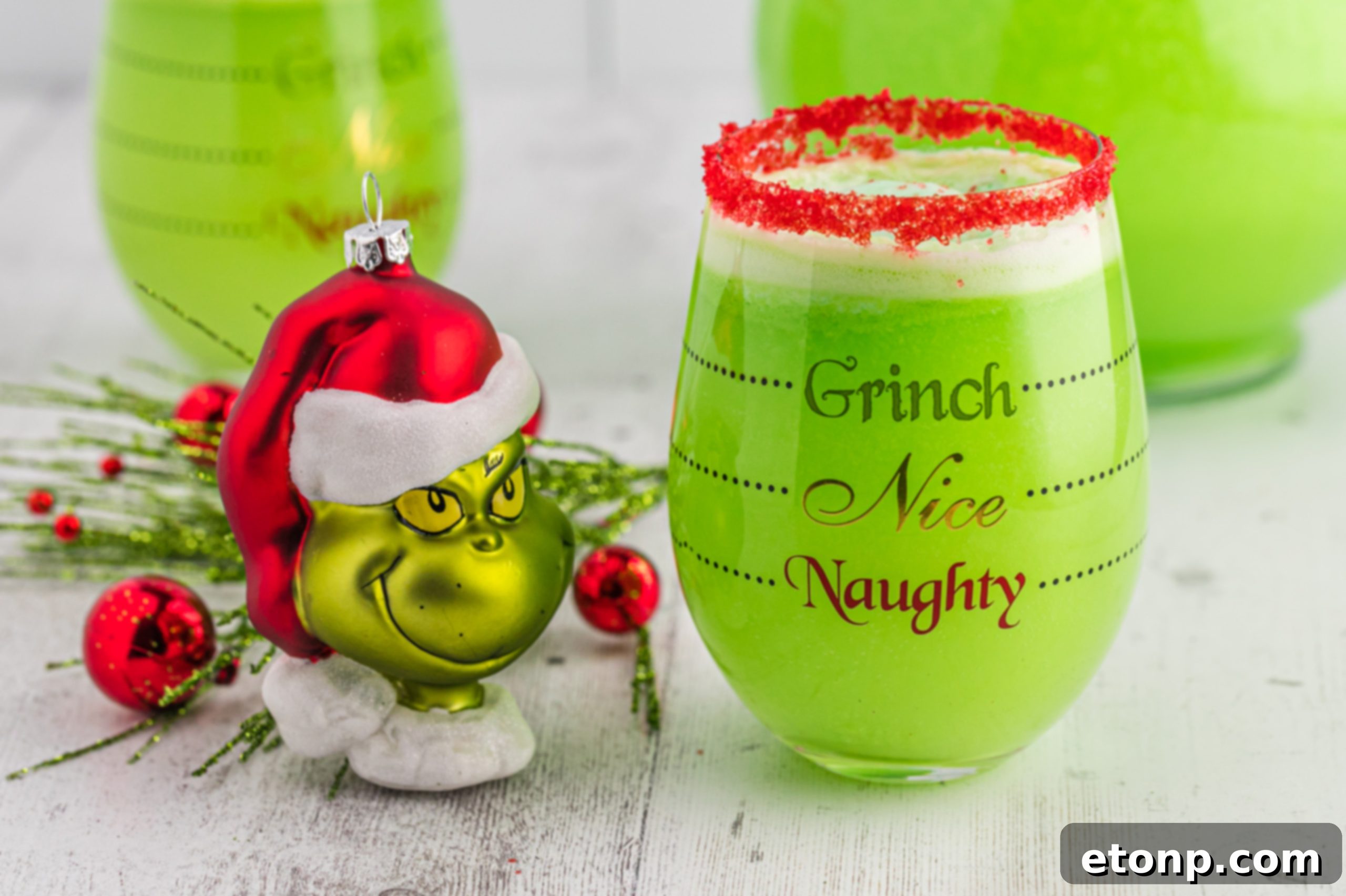 The Grinch's Heart-Growing Holiday Brew 6 A close-up of the Grinch Punch, showing its creamy texture and festive appeal in a clear glass.