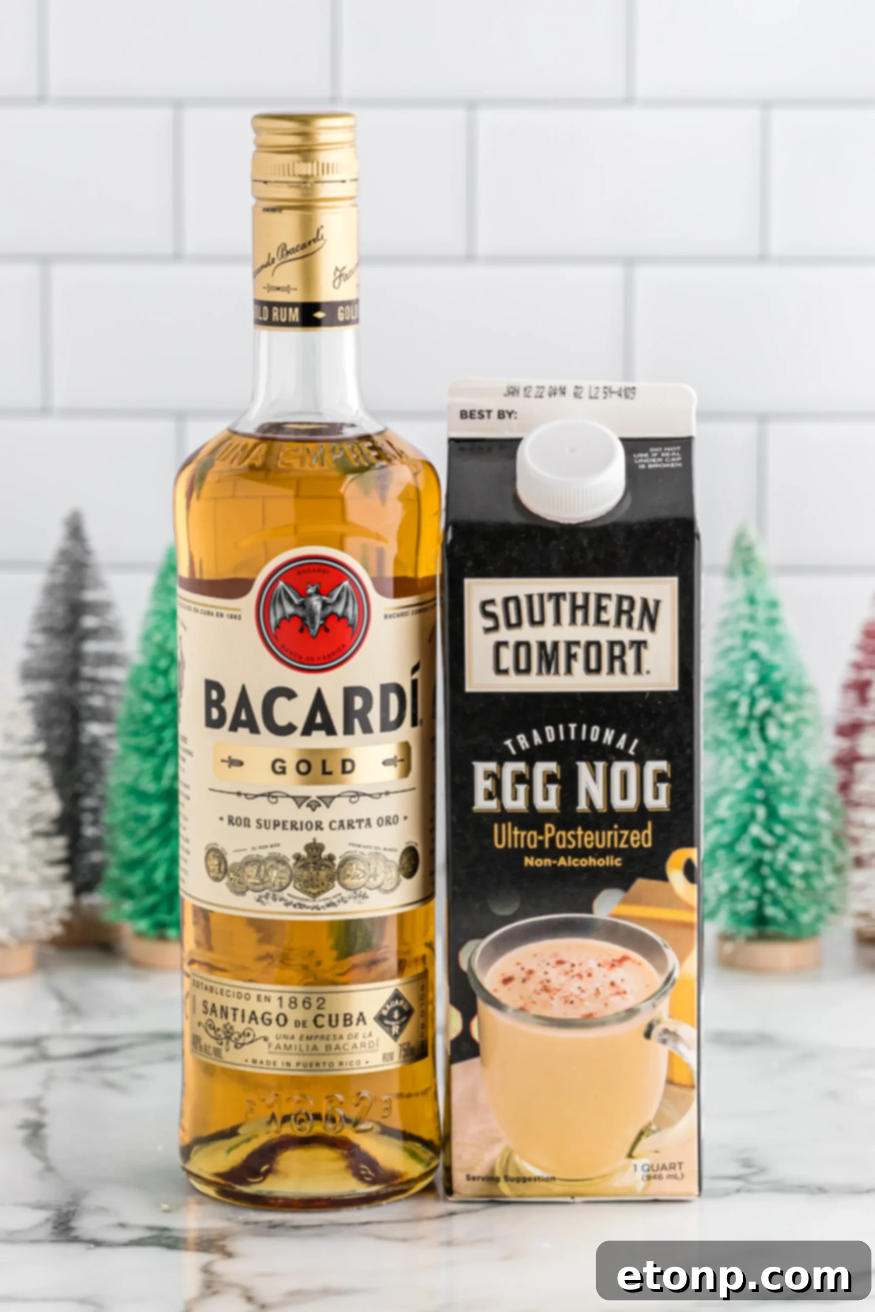 Rum-Drenched Eggnog Loaf 3 Two slices of moist Boozy Eggnog Bread with Rum Glaze, ready to be served