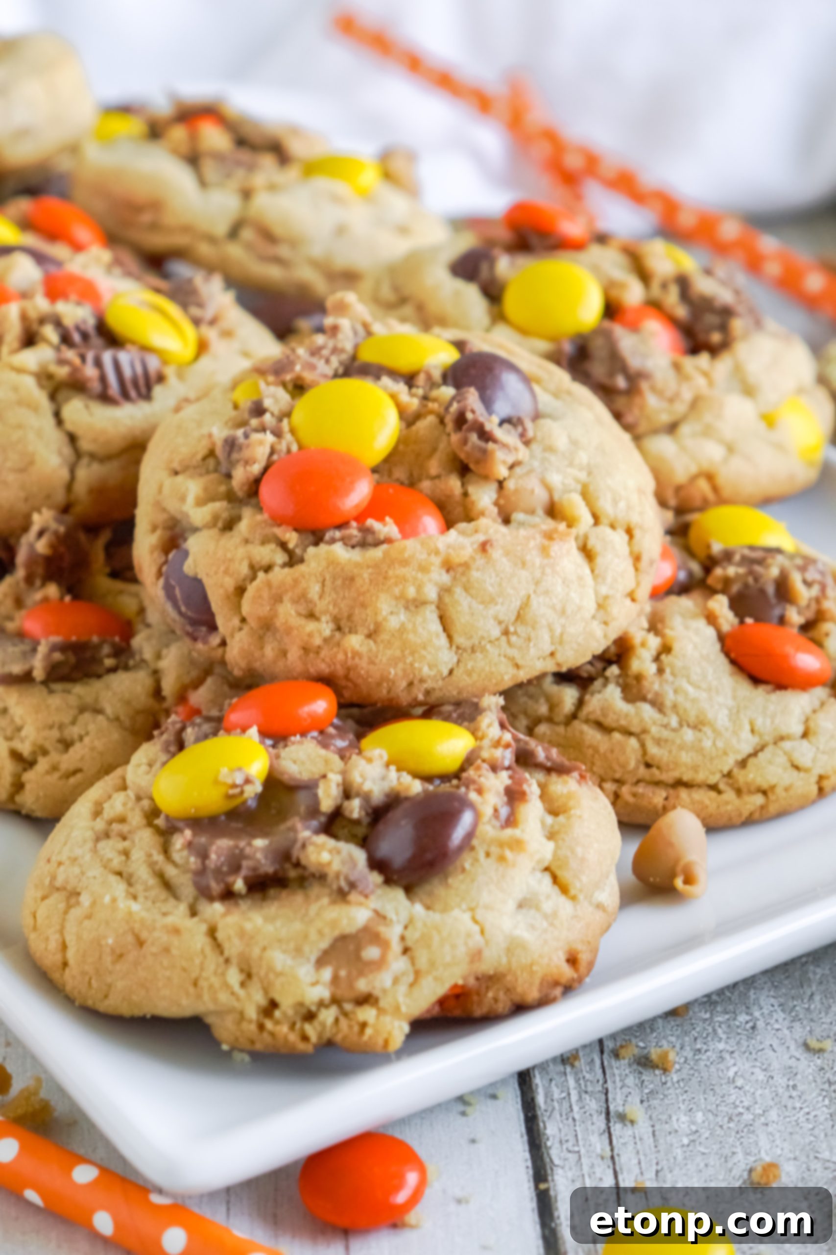 A bowl filled with the cookie dough mixture, showcasing the Reese's candies integrated within.