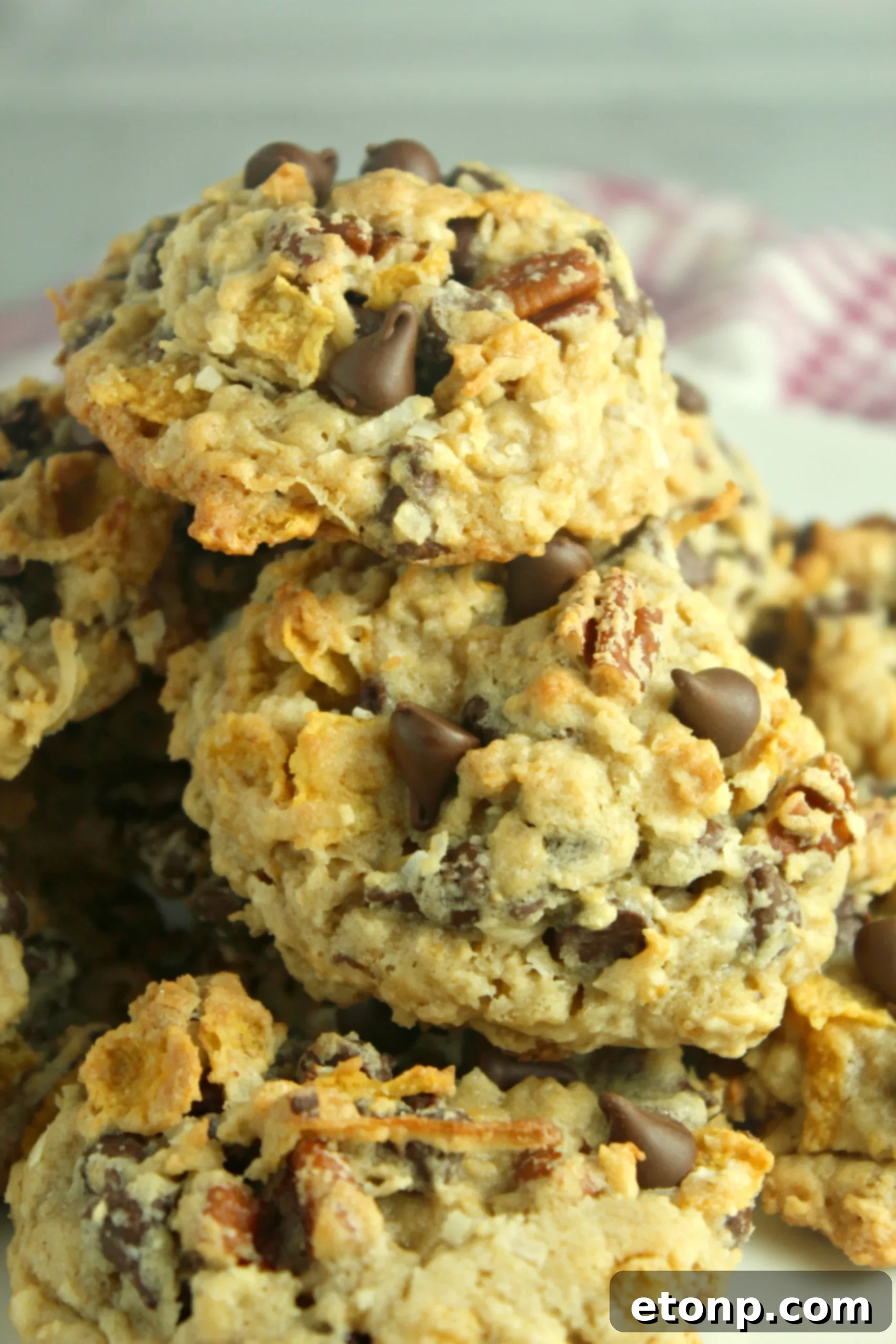 Delicious Cowboy Cookies baked to perfection on a cooling rack.