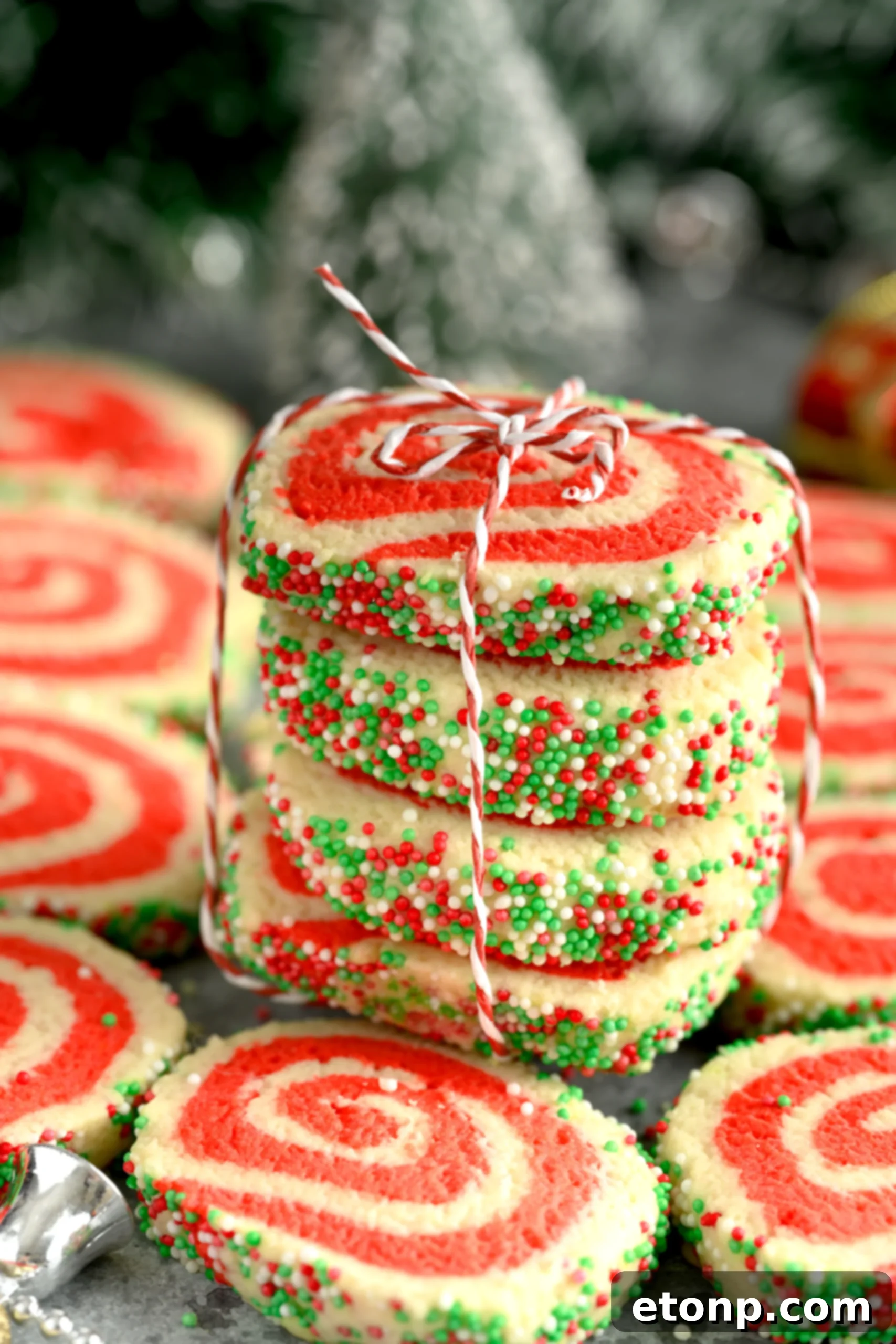 Yuletide Swirl Delights 13 A stack of baked Christmas Pinwheel Cookies