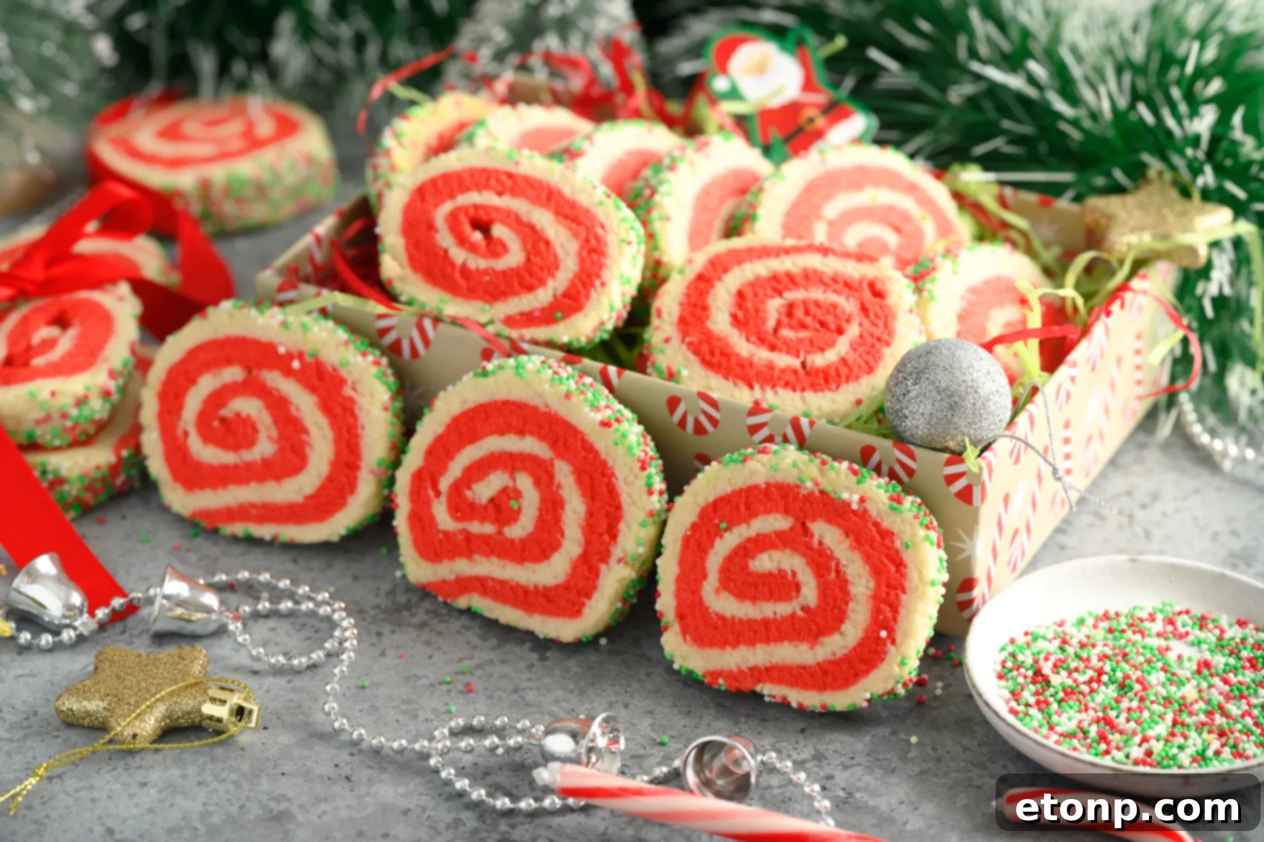 Yuletide Swirl Delights 16 A spread of Christmas cookies including pinwheels