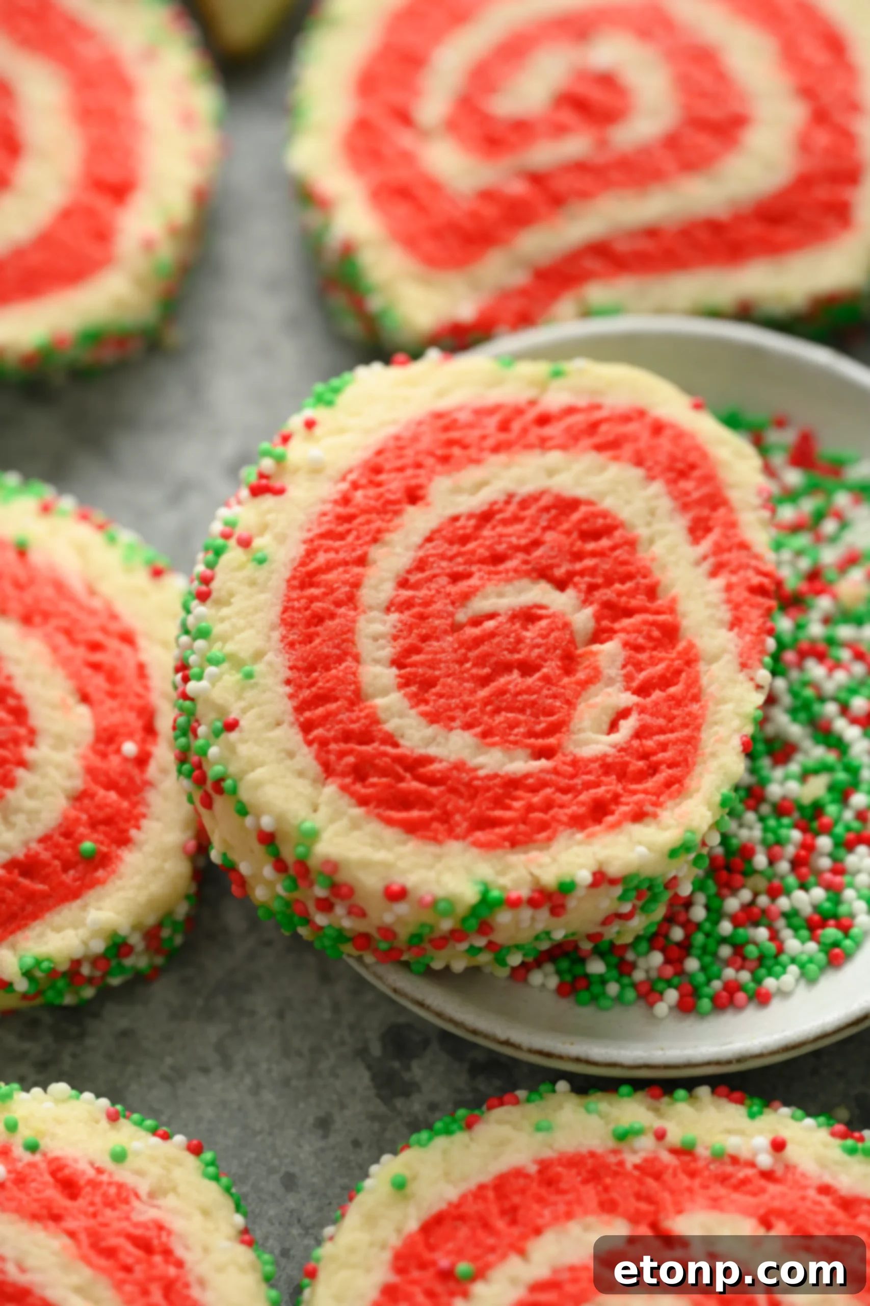 Yuletide Swirl Delights 5 Baked Christmas Pinwheel Cookies arranged on a cooling rack