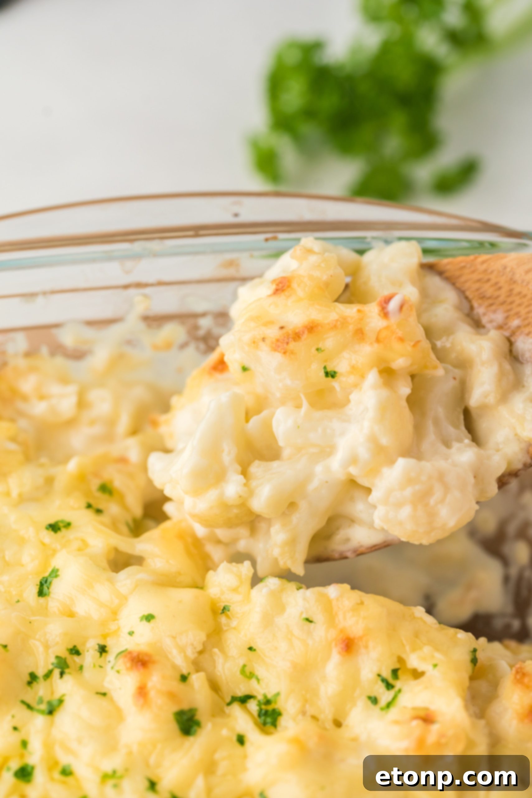 Mixing the sauce for Cheesy Cauliflower Casserole