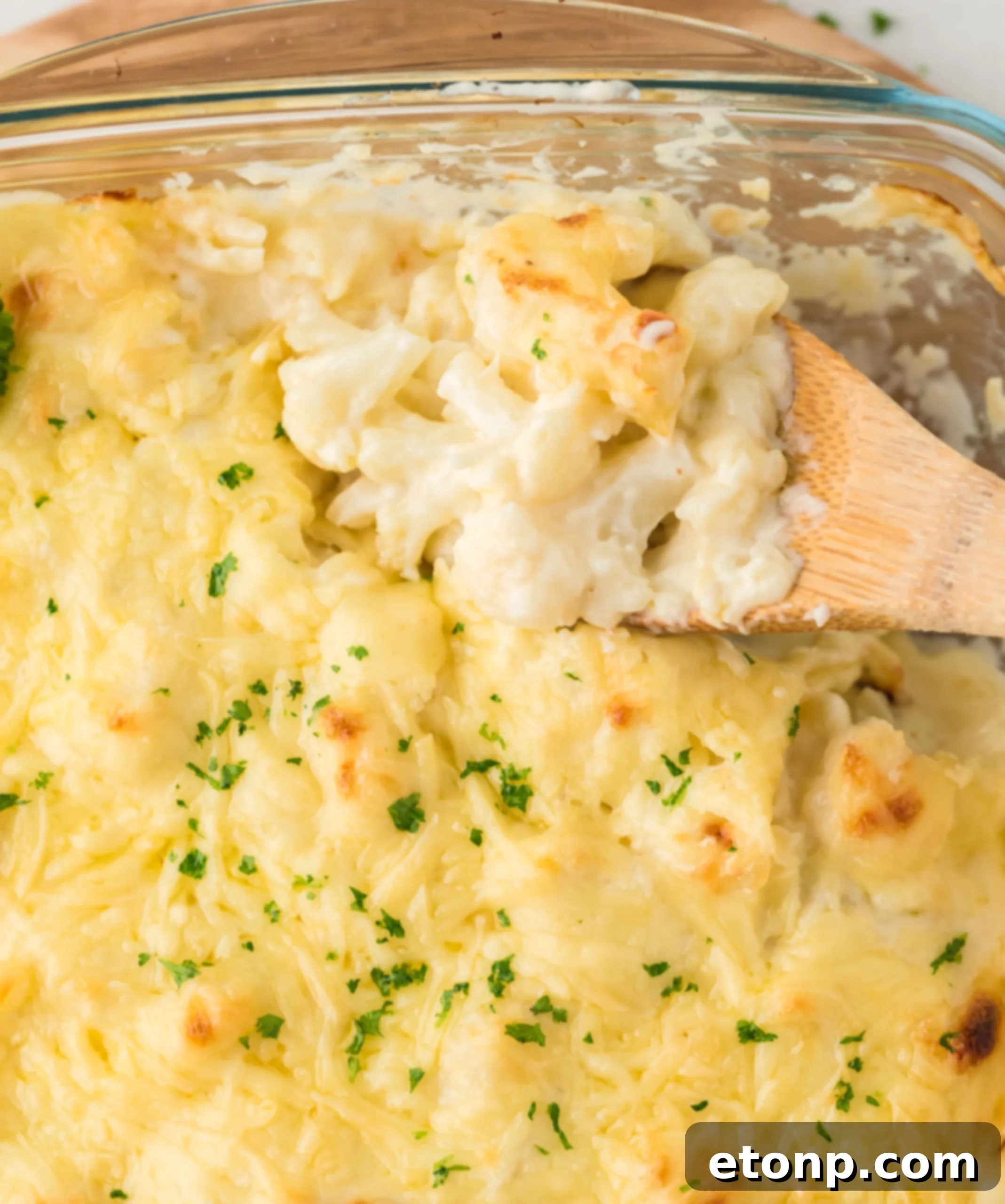 Assembling the Cheesy Cauliflower Casserole