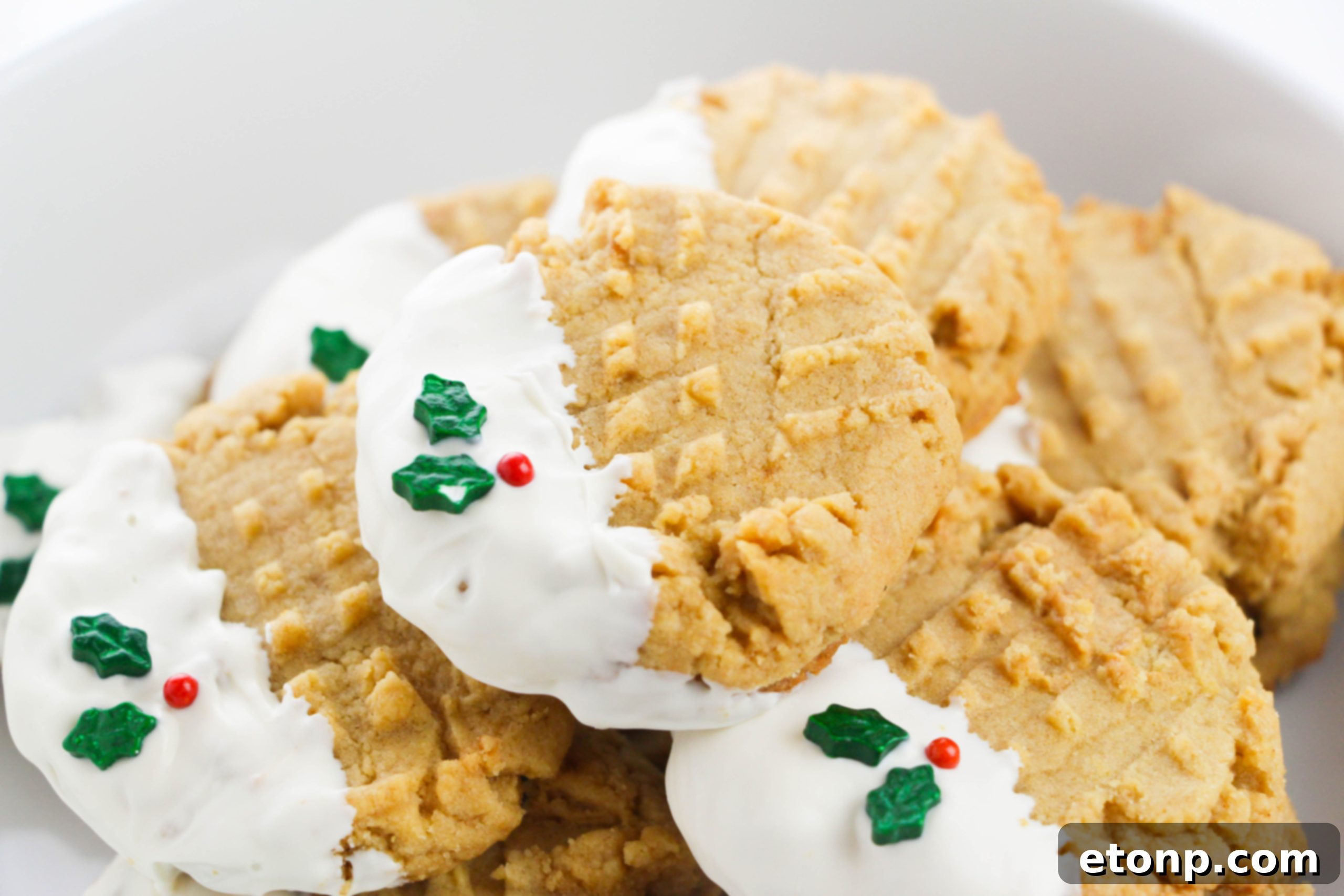 Silky White Chocolate Peanut Butter Cookies 7 White chocolate dipped peanut butter cookies with a mix of chocolate types