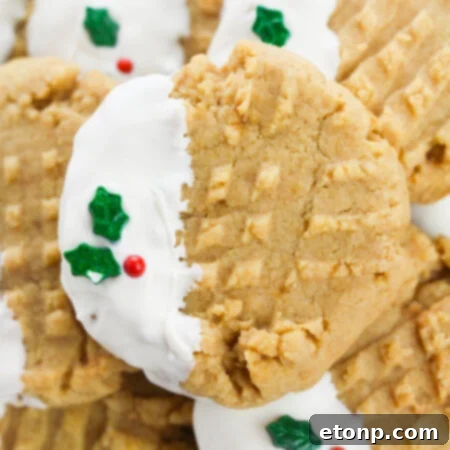 Silky White Chocolate Peanut Butter Cookies 10 White Chocolate Dipped Peanut Butter Cookies recipe hero image