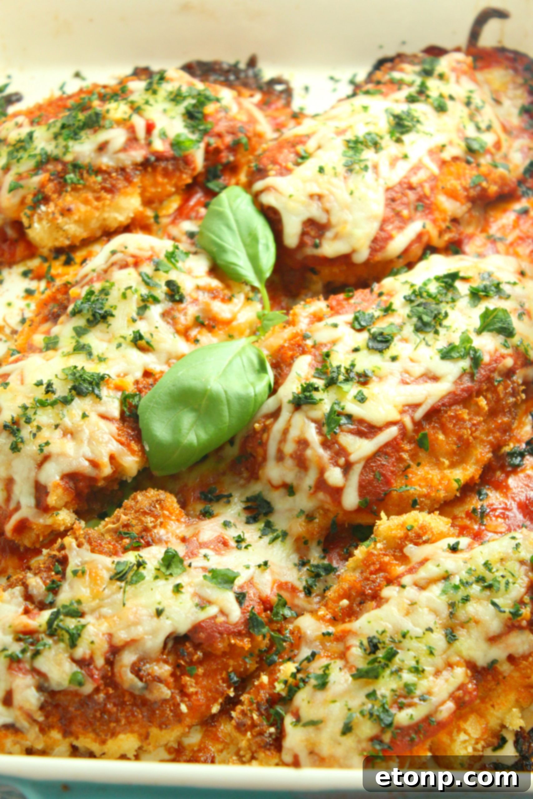 Crispy, Cheesy Chicken Parmesan 9 Homemade tomato sauce simmering on the stove