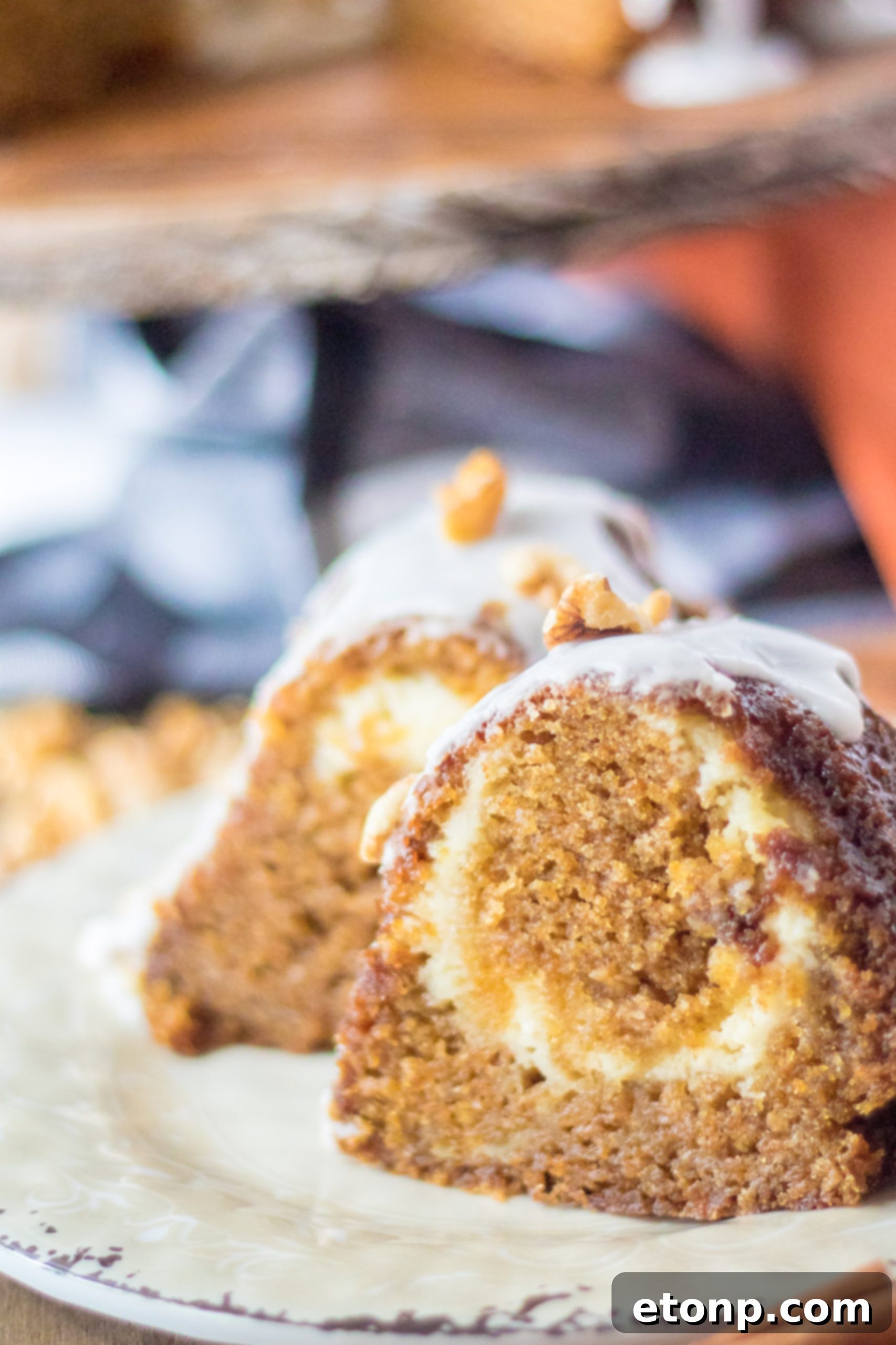 Carrot Cake with a Cheesecake Heart 12 Drizzling glaze on Cheesecake Stuffed Carrot Cake