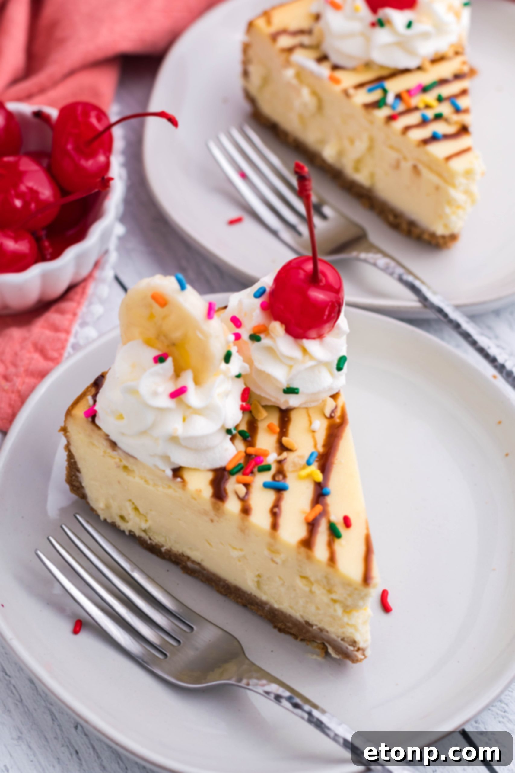 A freshly baked Banana Split Cheesecake cooling on a wire rack, with a perfectly golden crust and a smooth, slightly domed surface, ready for its delicious toppings.