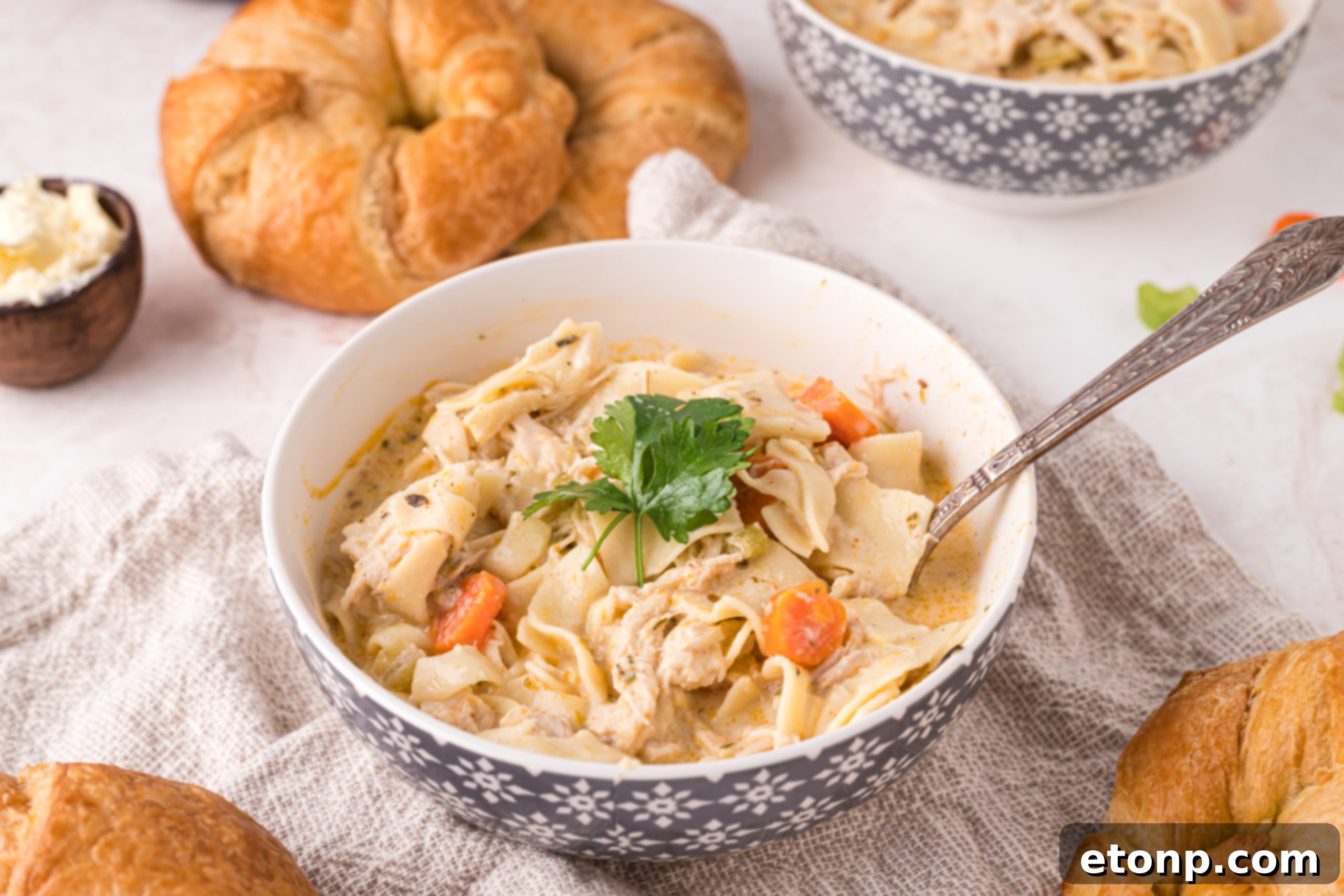 A carton of heavy cream, emphasizing its importance for the soup's creamy texture.