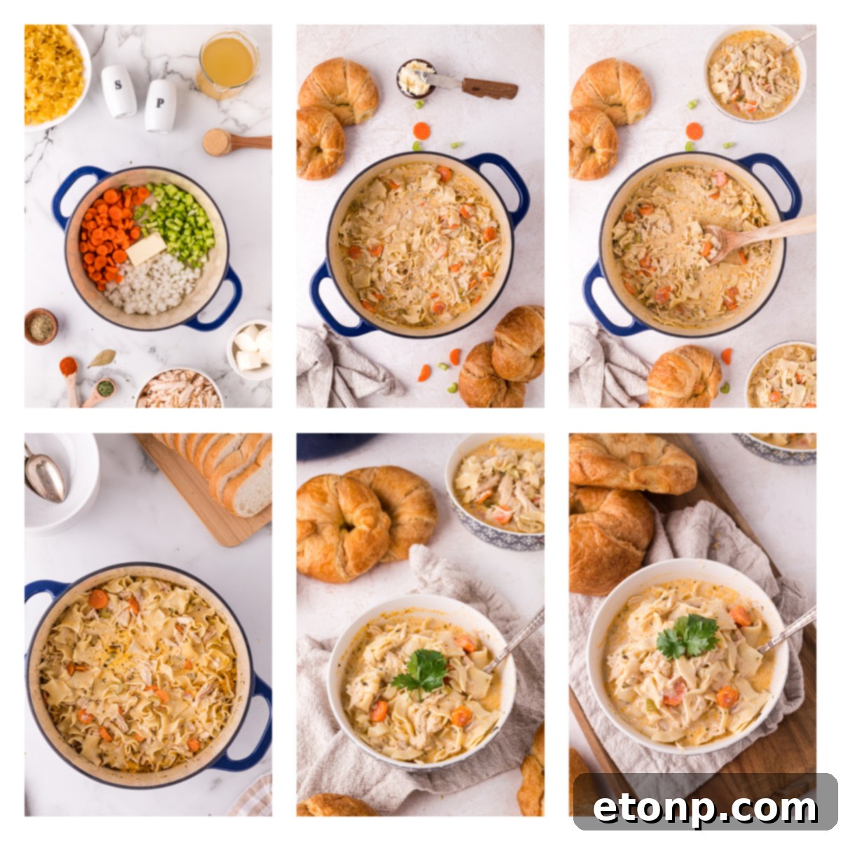 Overhead shot of a bowl of creamy chicken noodle soup next to fresh ingredients like celery, carrots, and onions.