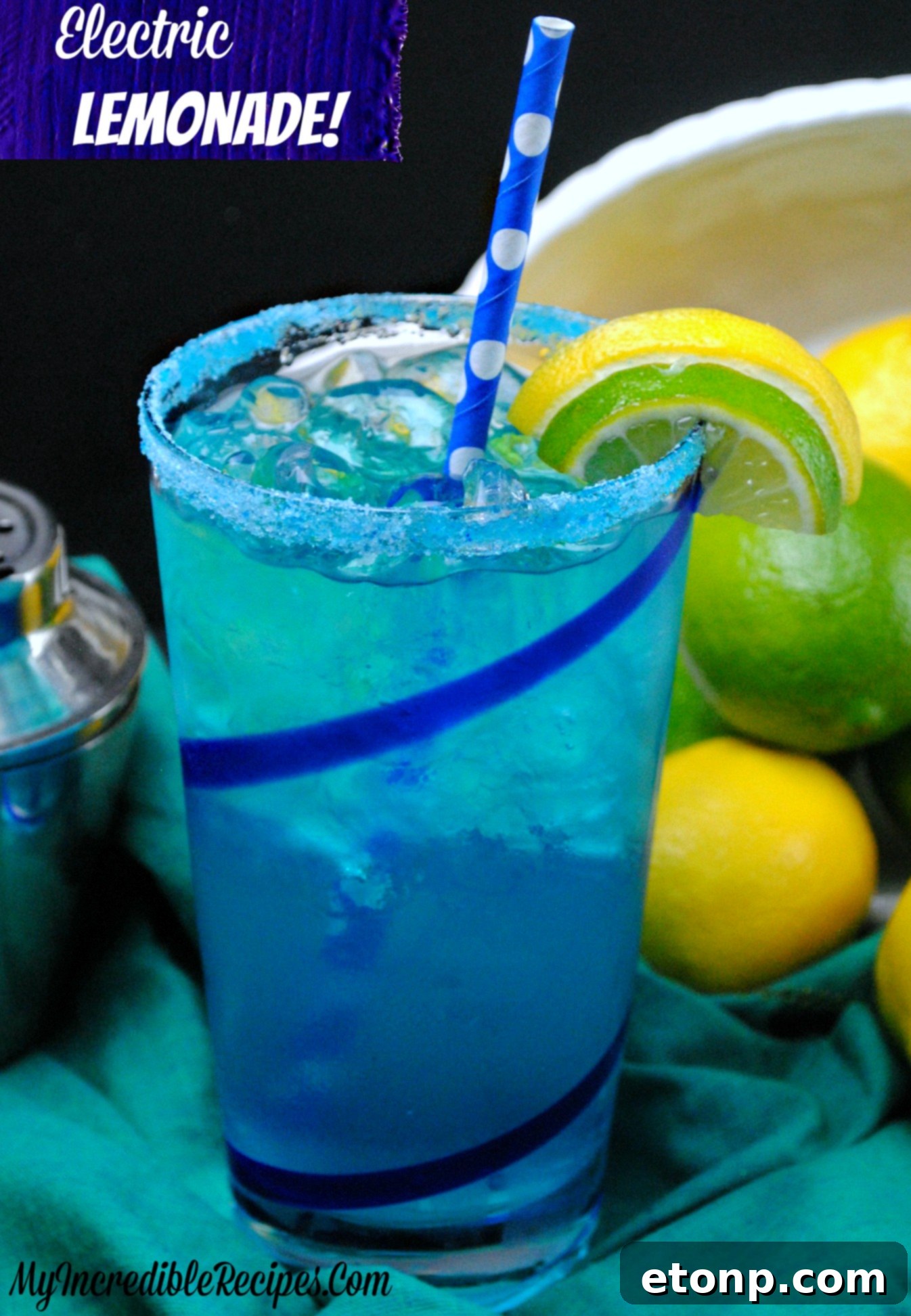 Vibrant Electric Lemonade Cocktail A vibrant blue Electric Lemonade cocktail garnished with a lemon slice and a cherry, served in a tall glass with a sugar-rimmed edge, perfect for summer parties.
