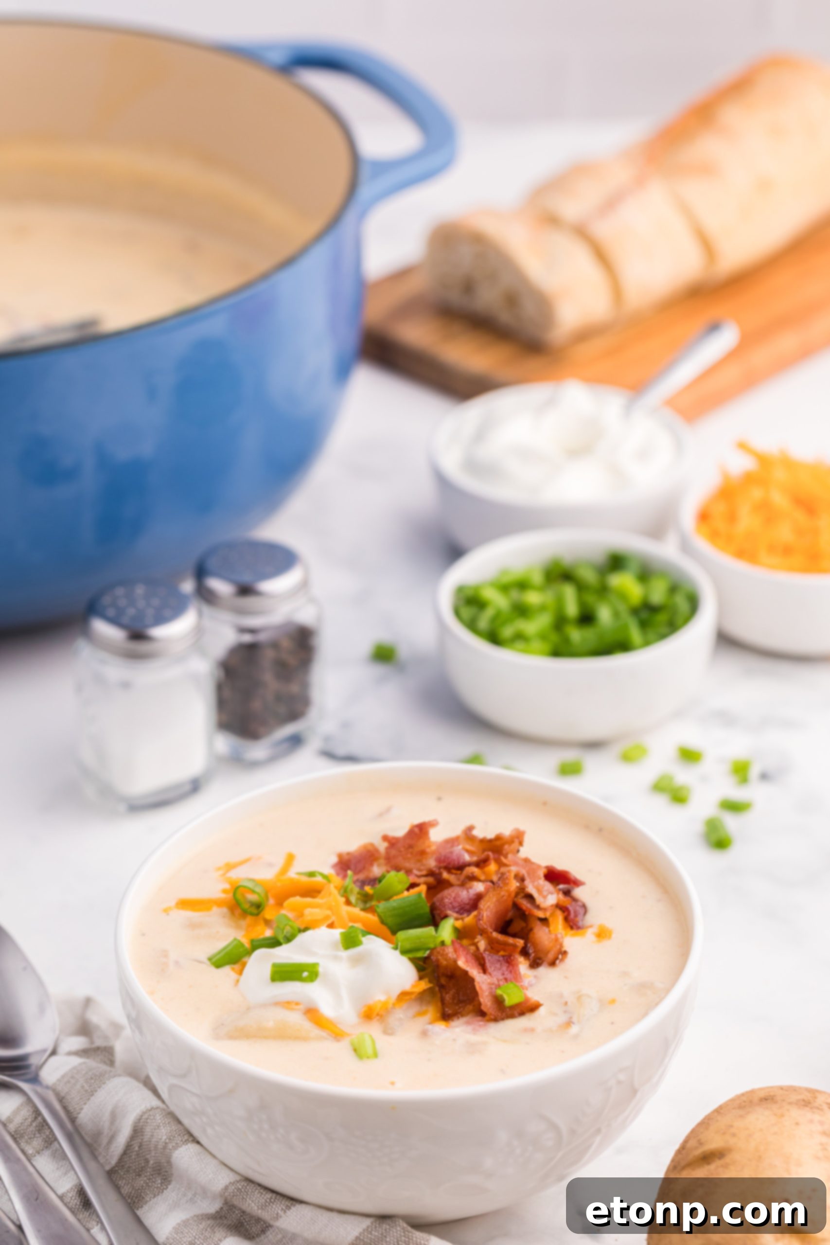 Loaded Baked Potato Soup served with crusty bread