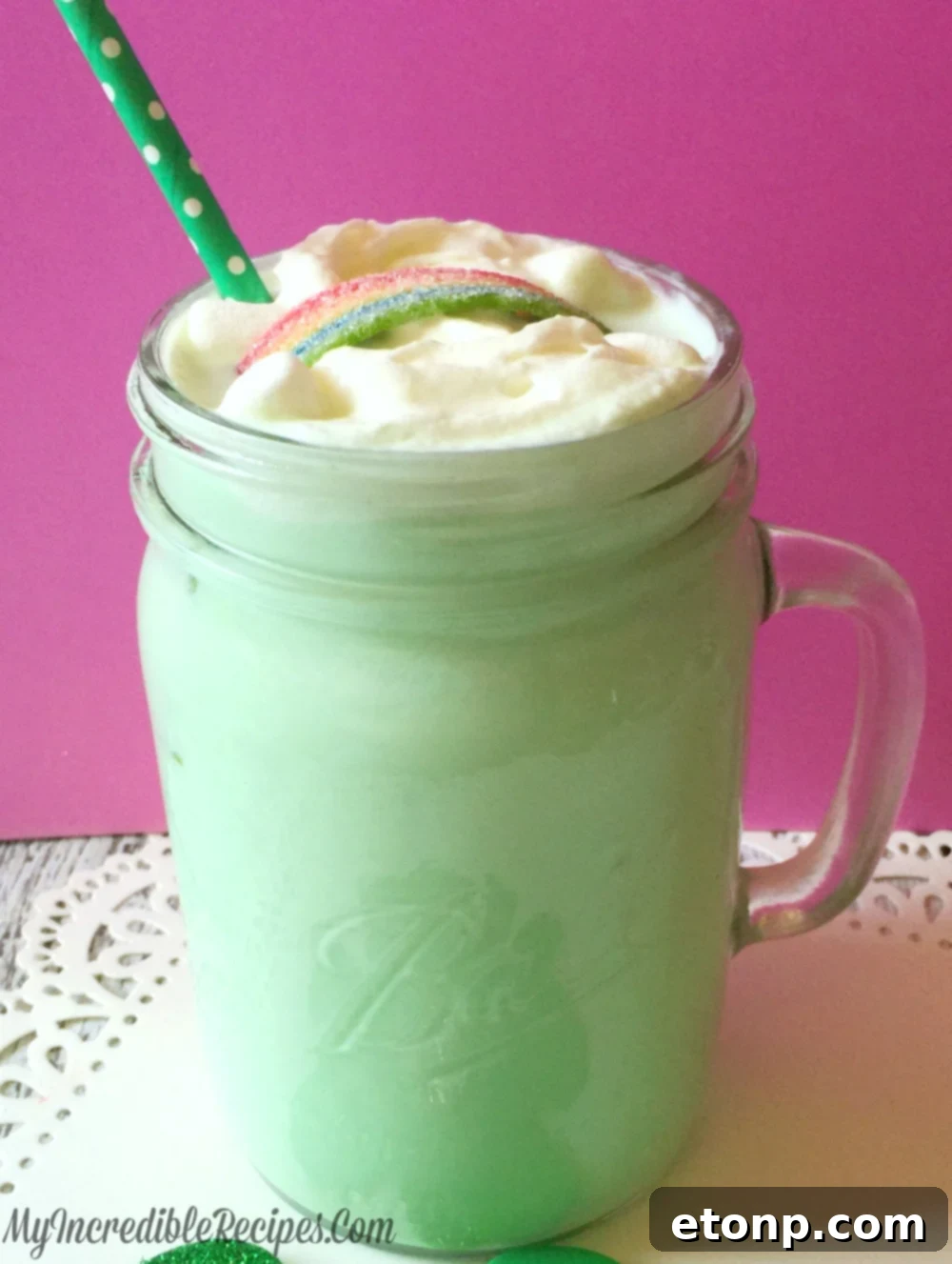 Close-up of Shamrock Cocoa with colorful rainbow candy garnish
