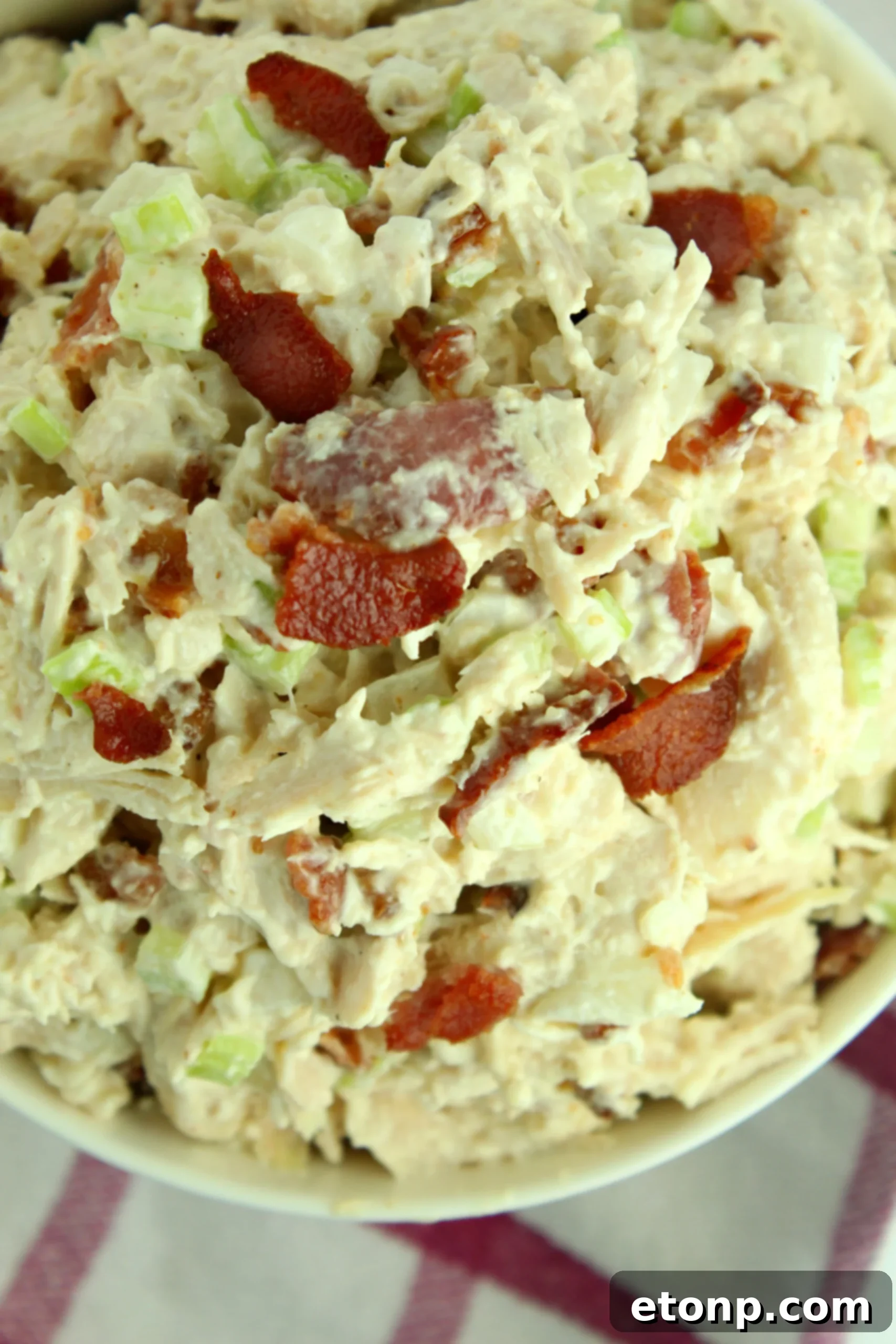 Crispy bacon bits, ready to be added to chicken salad.