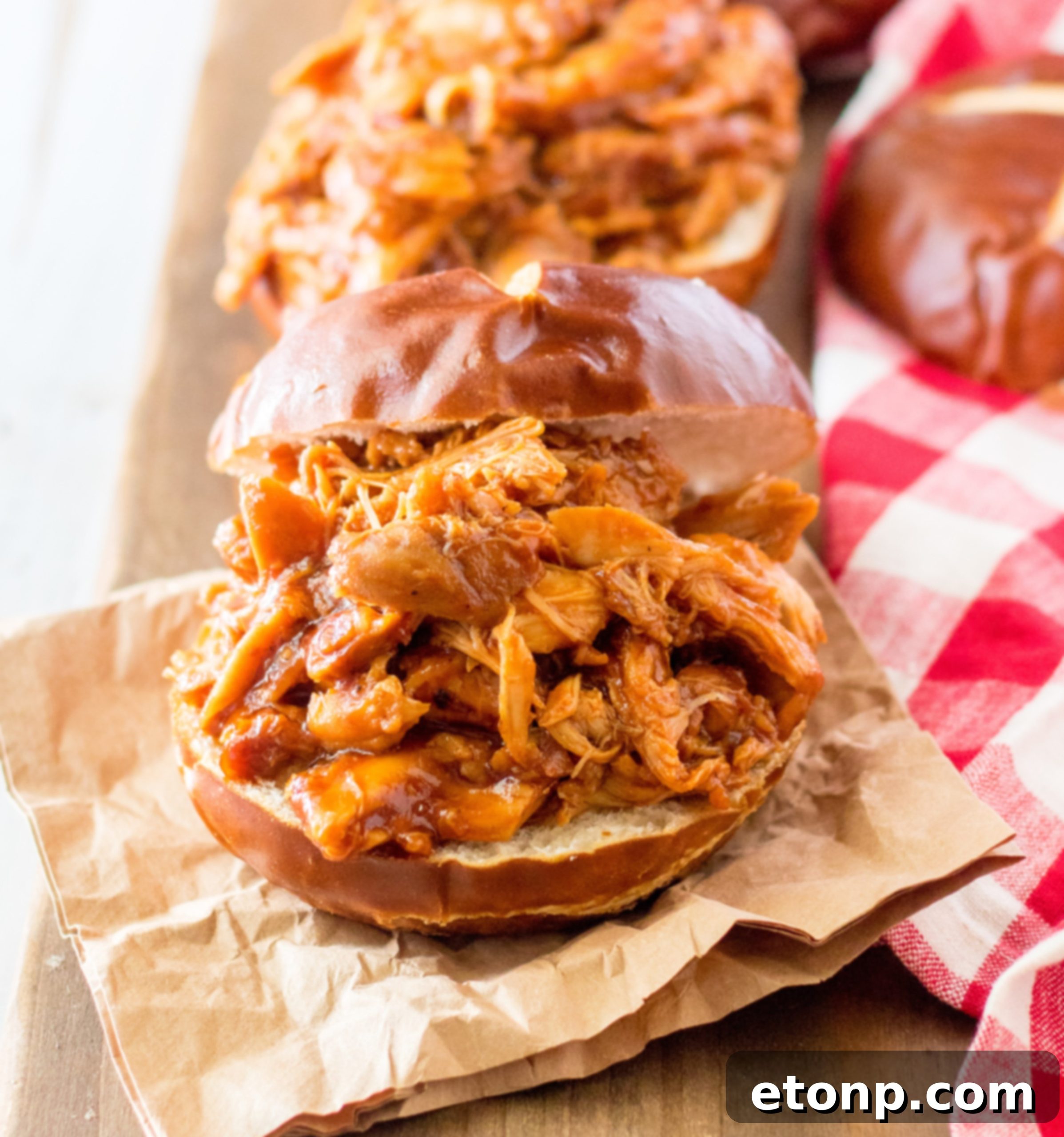 Slow Cooker Root Beer Chicken Piled on a Bun