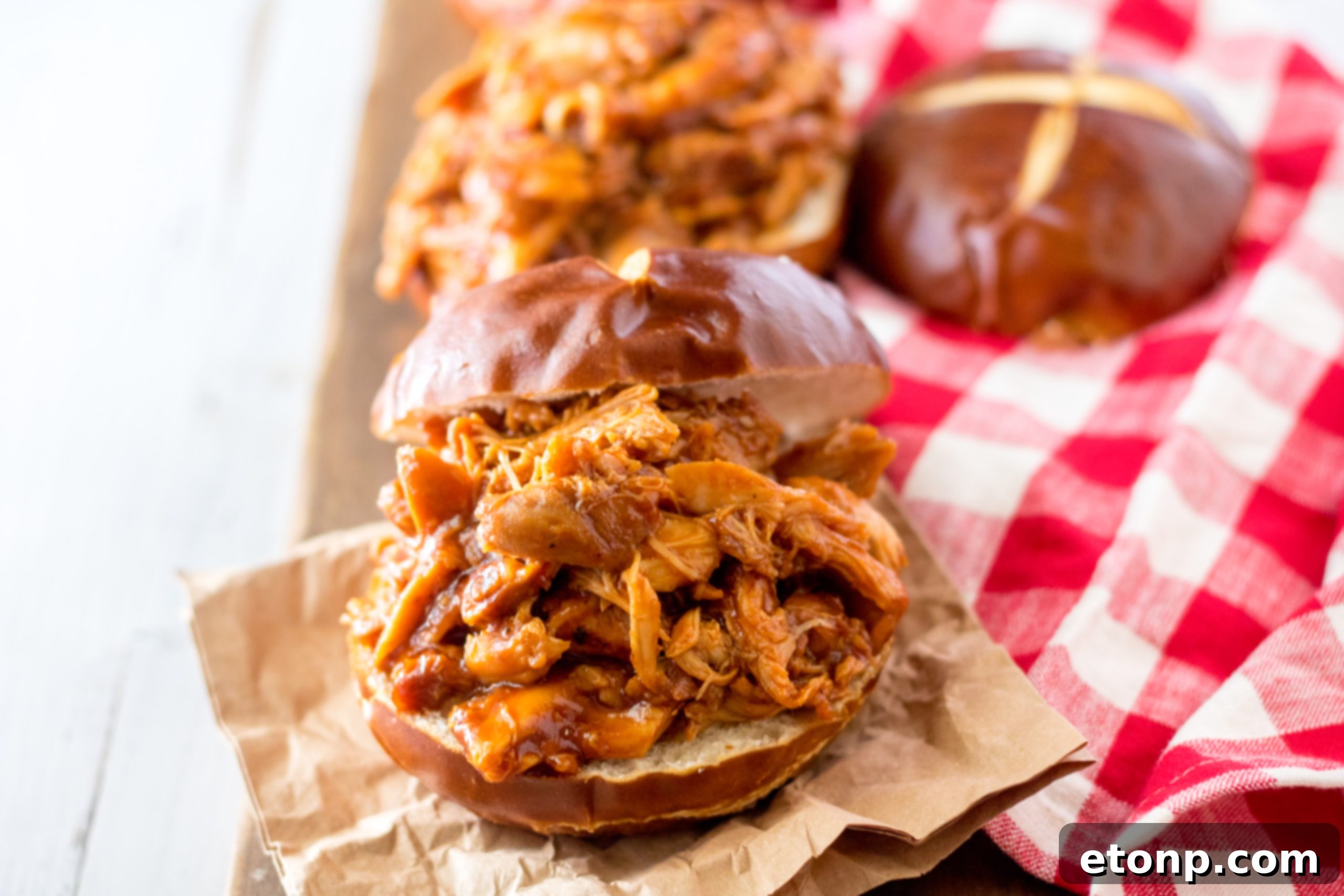 Slow Cooker Root Beer Chicken being shredded