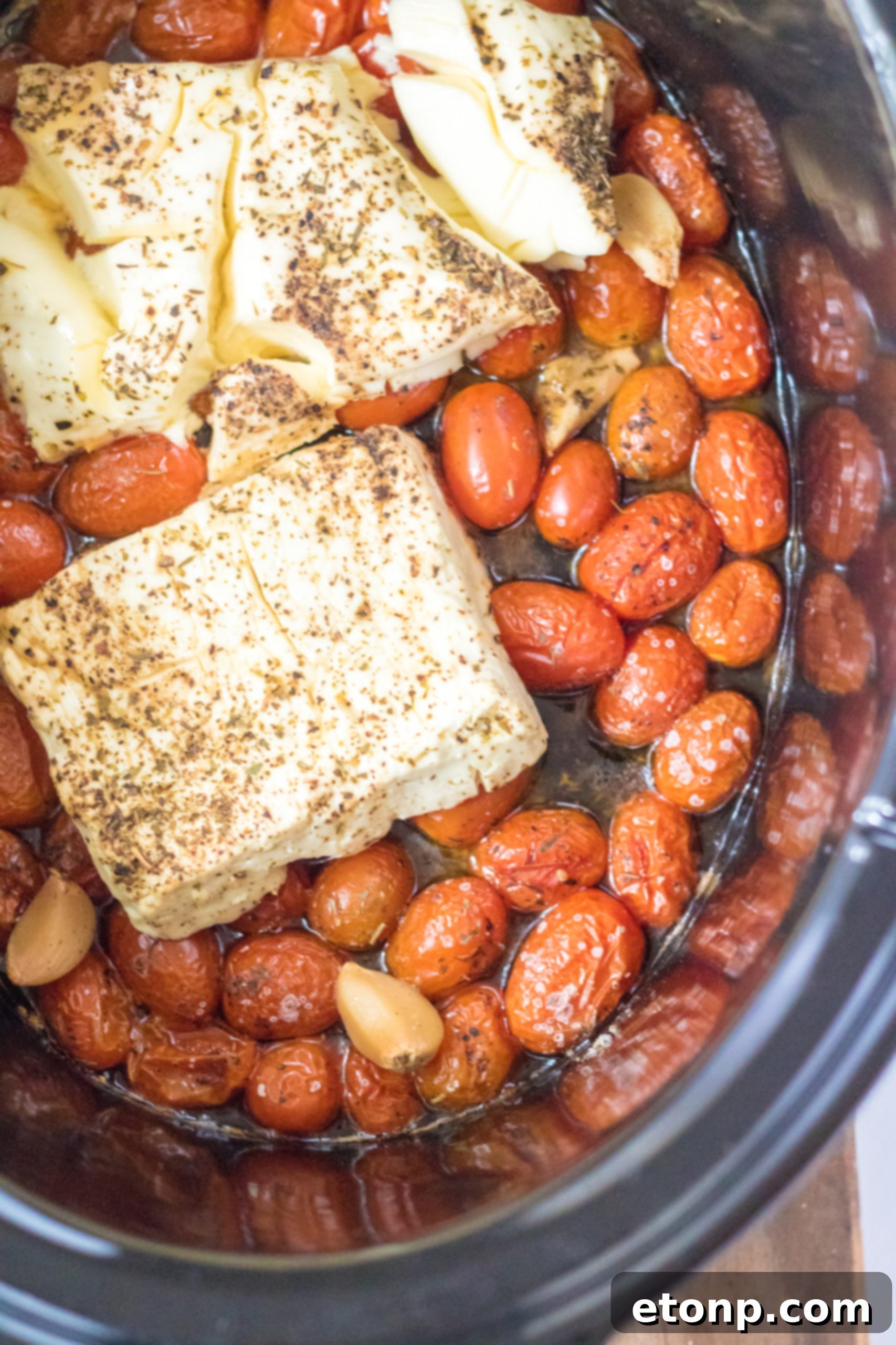 Slow Cooker Tomato Feta Pasta cooking in the slow cooker