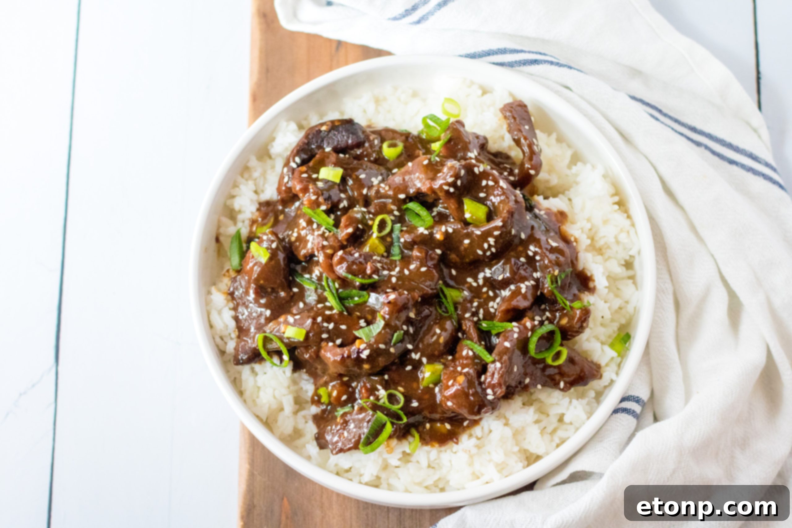 Slow Cooker Mongolian Beef with rice and steamed broccoli