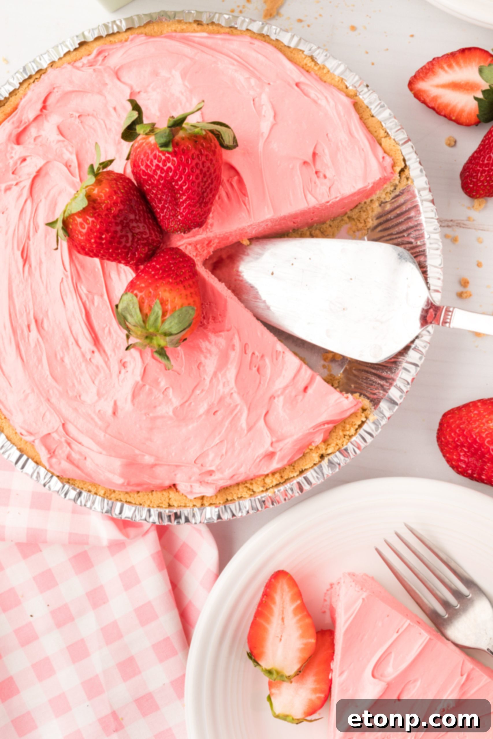 A collection of colorful no-bake mini pies, each representing a different Kool-Aid flavor, arranged attractively on a platter.