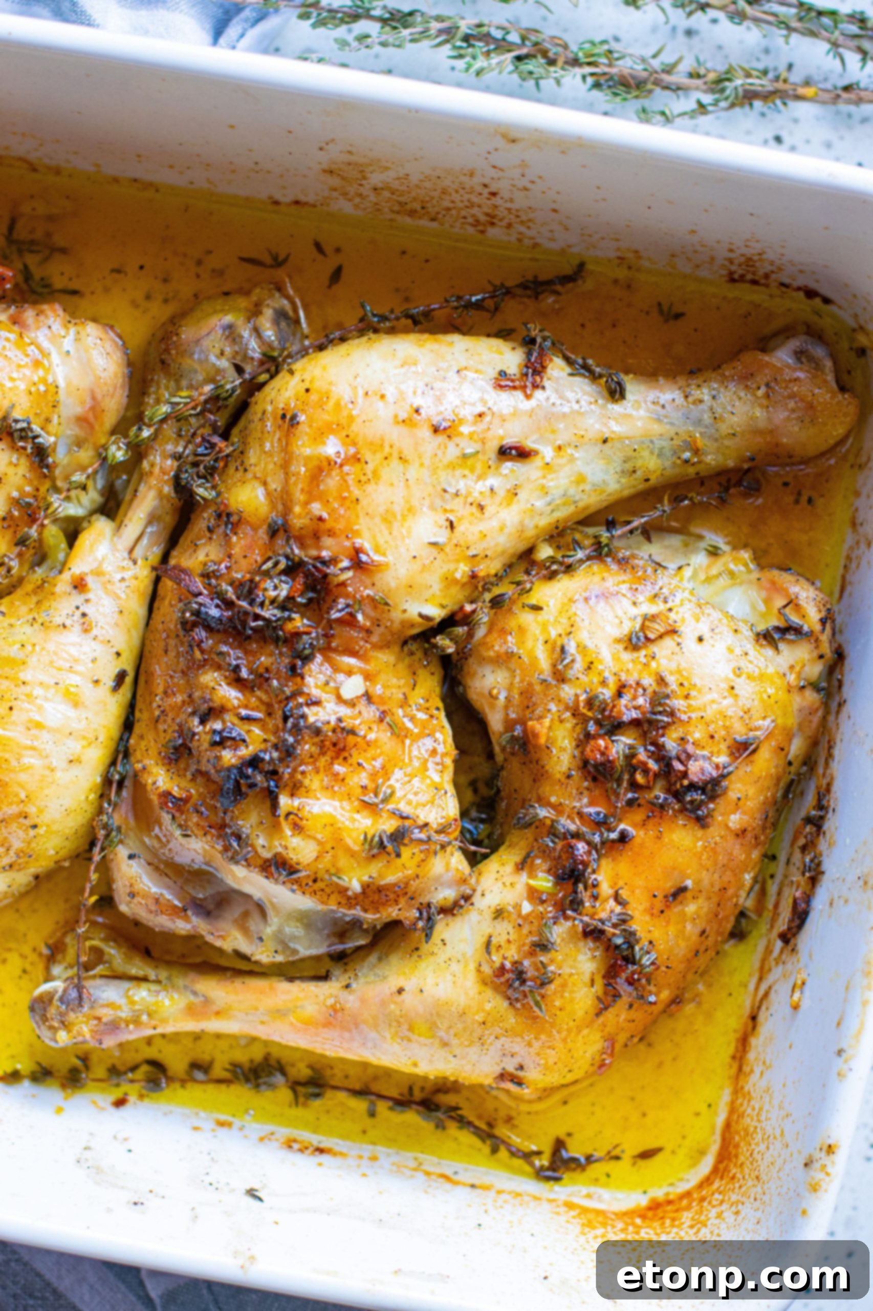 Golden Garlic Butter Roasted Chicken 4 A dish of perfectly baked garlic butter chicken