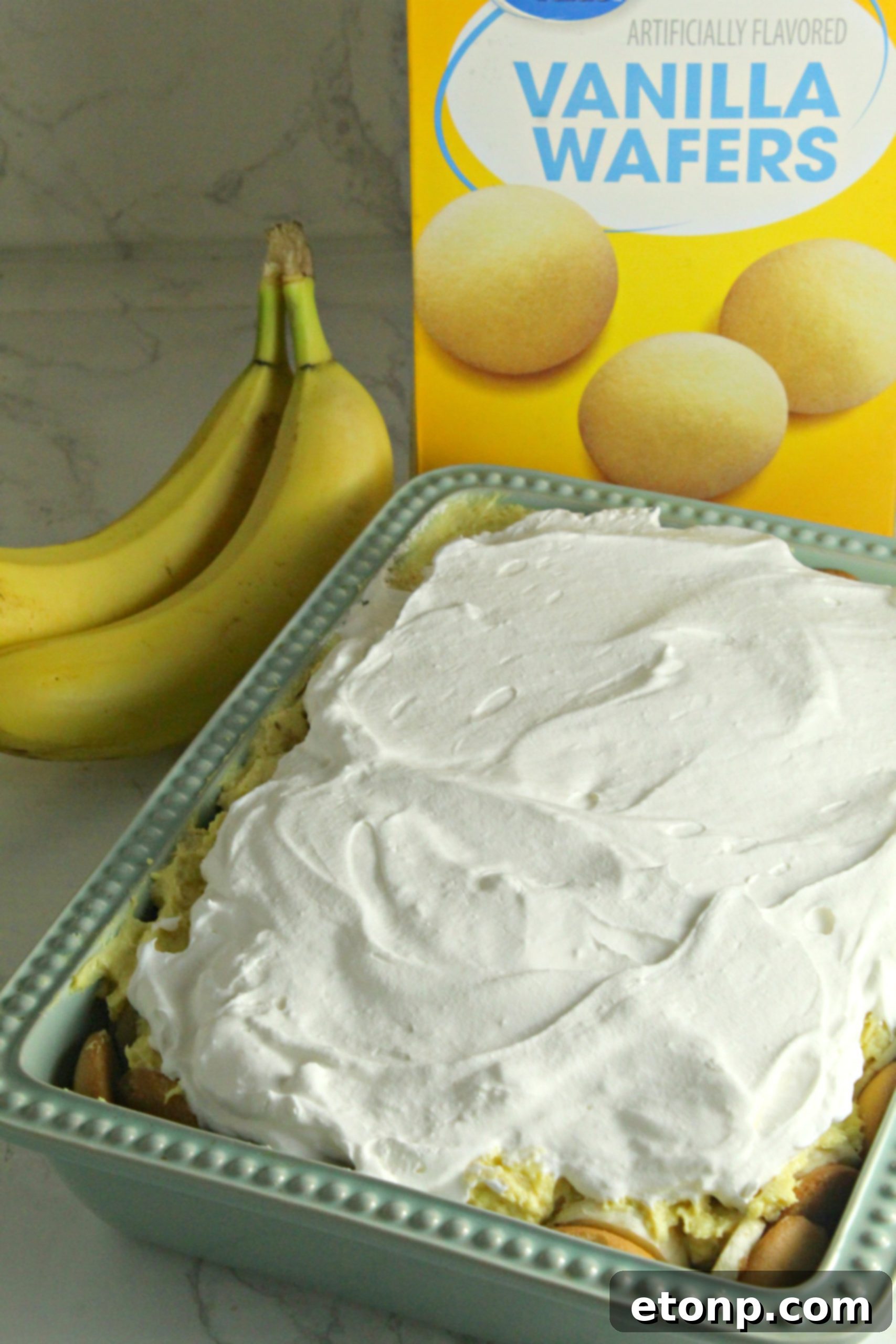 No-bake banana pudding layered with wafers and banana slices