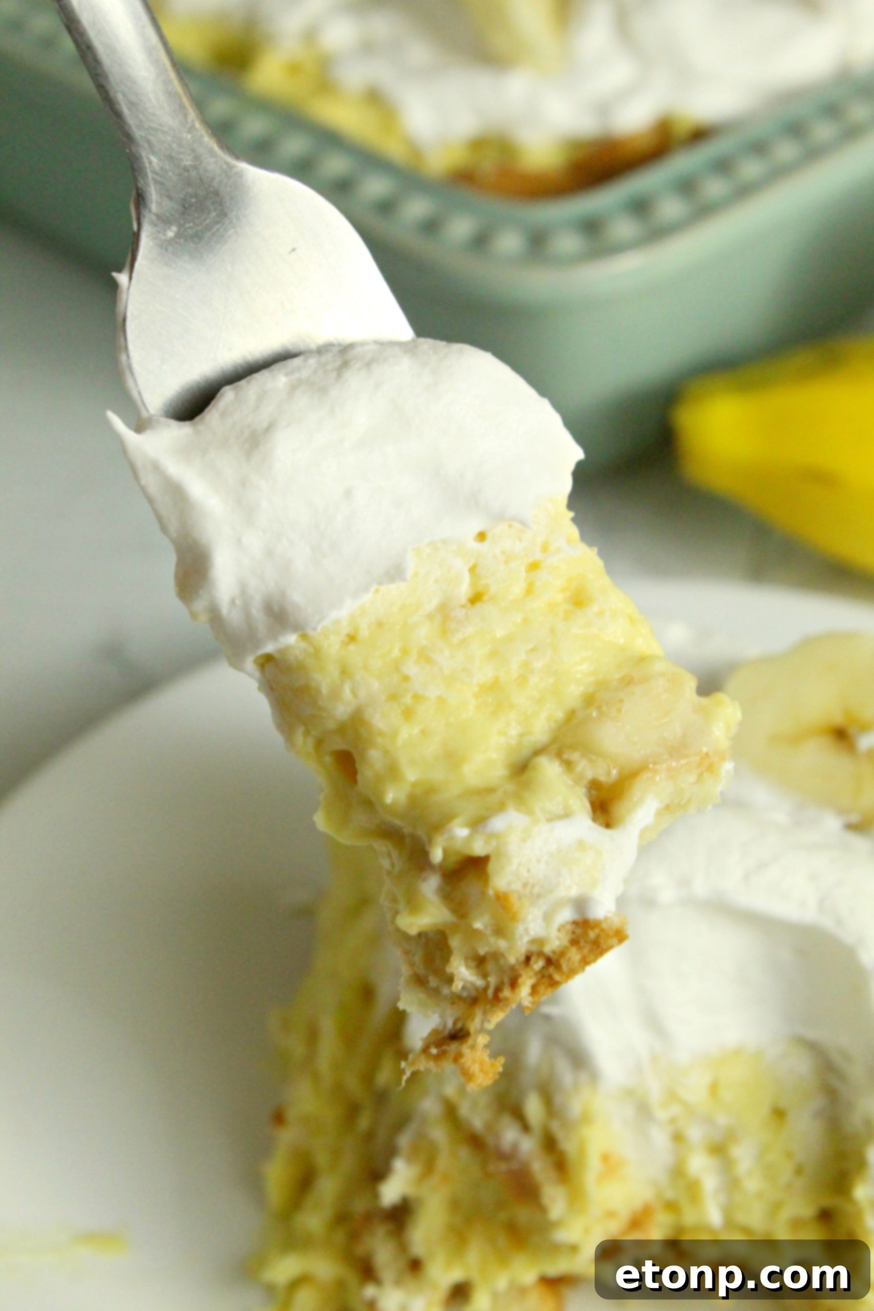 Whipped topping being folded into the pudding mix