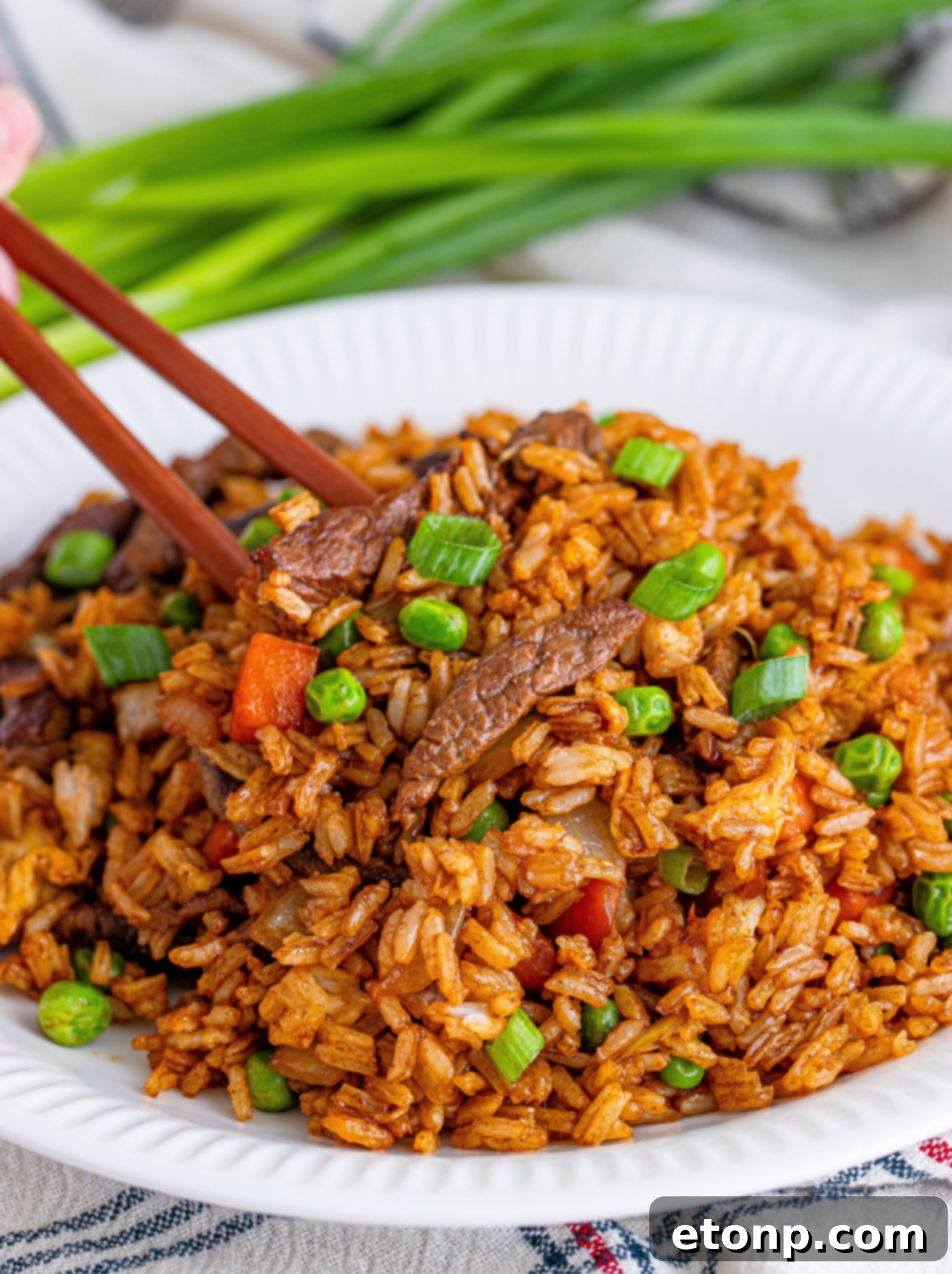 Beef Fried Rice cooking in a skillet