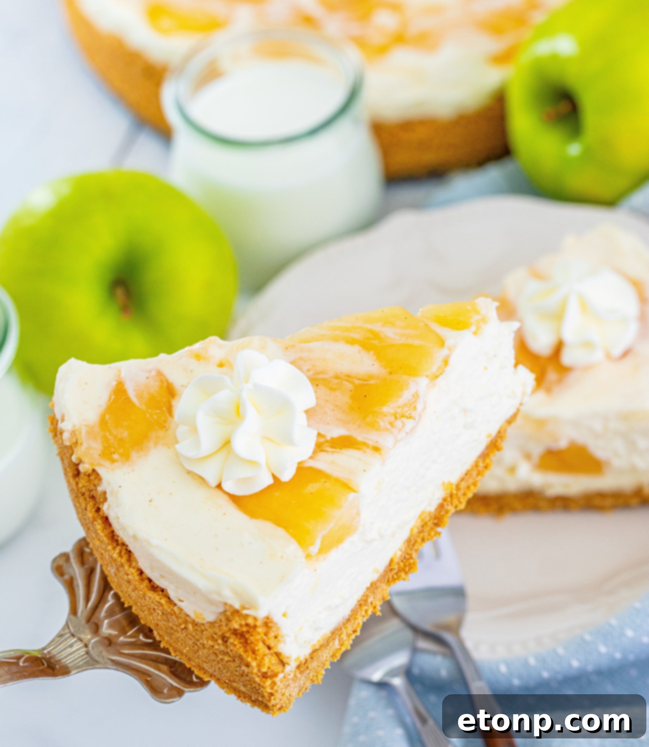 A close-up of the smooth, creamy texture of the No Bake Apple Cheesecake filling.