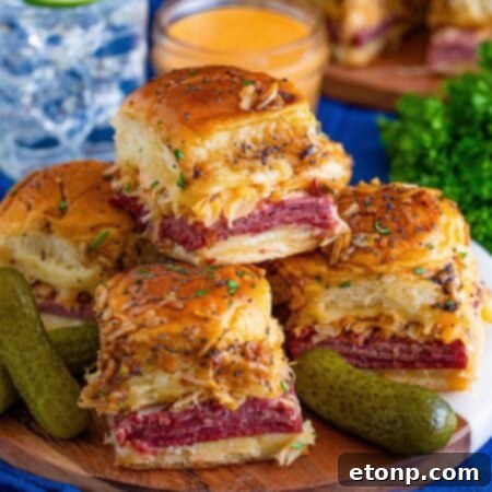 Mini Reuben Sandwiches 19 A perfectly baked Reuben Slider, golden brown and garnished with fresh parsley.