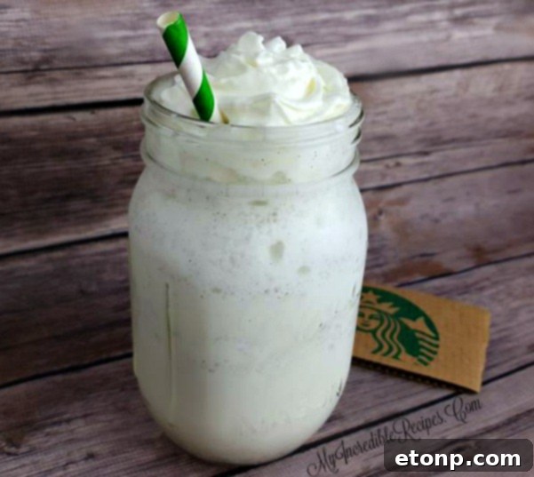 Homemade Vanilla Bean Frappuccino served in a tall glass with whipped cream