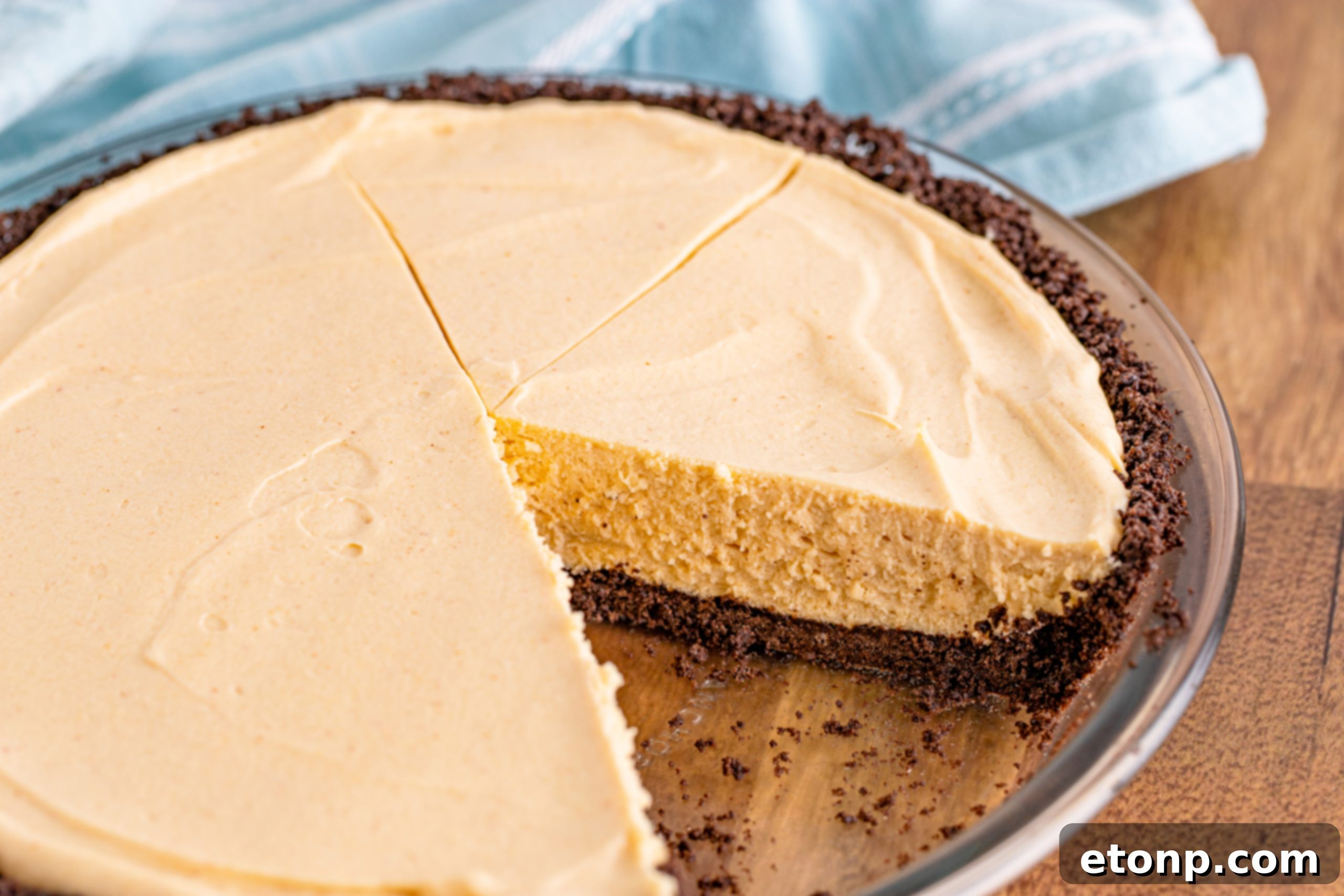 No Bake Peanut Butter Pie, ready to be sliced, garnished with chocolate shavings