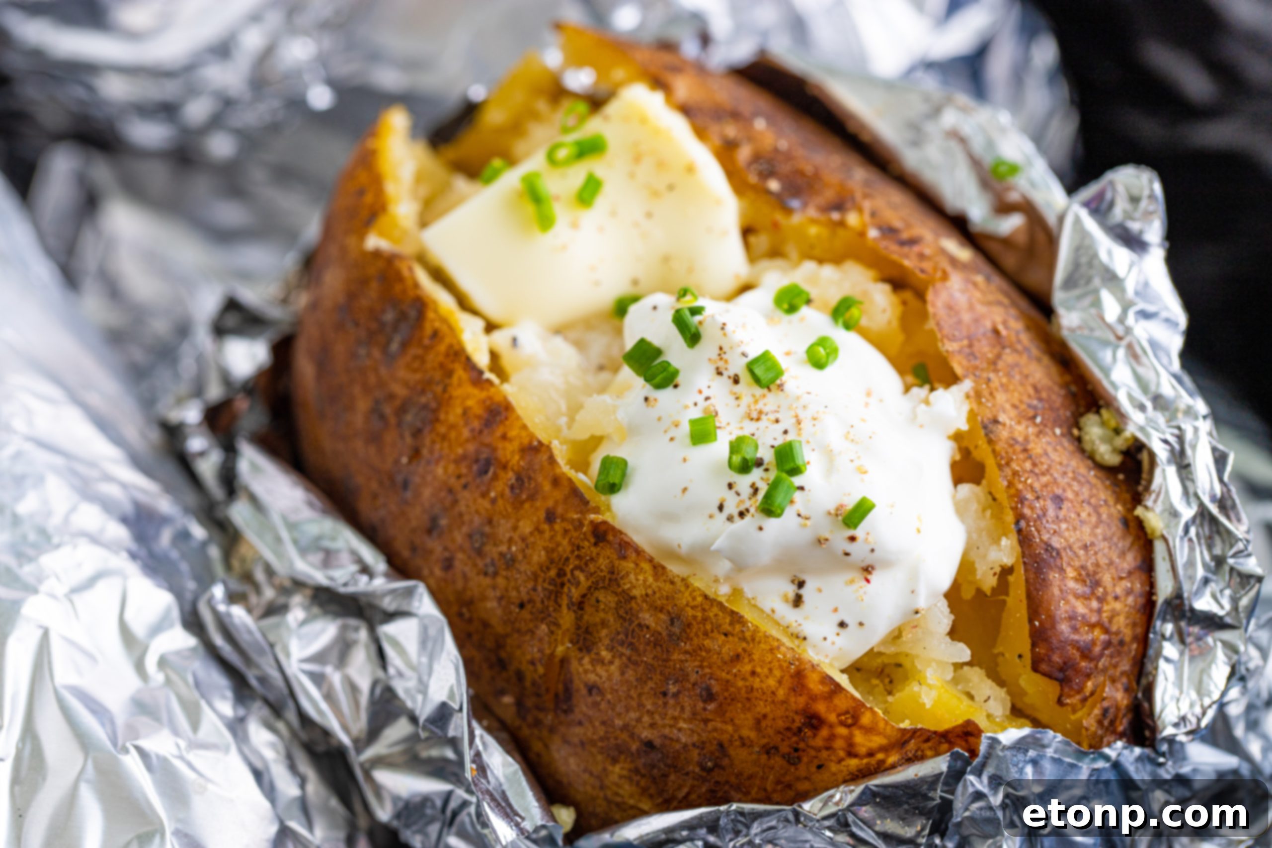 Variety of toppings for baked potatoes displayed