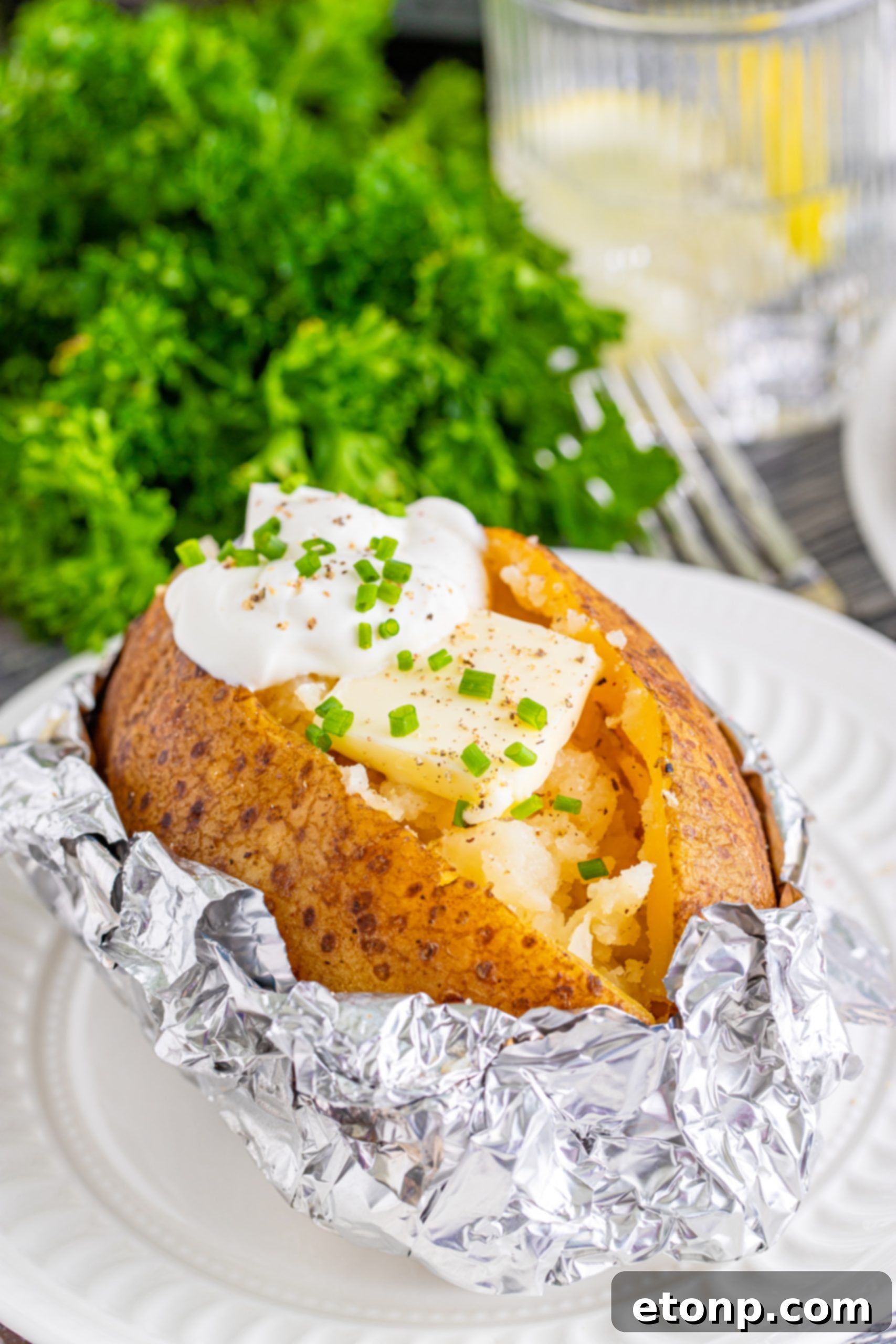 Another view of slow cooker baked potatoes with toppings