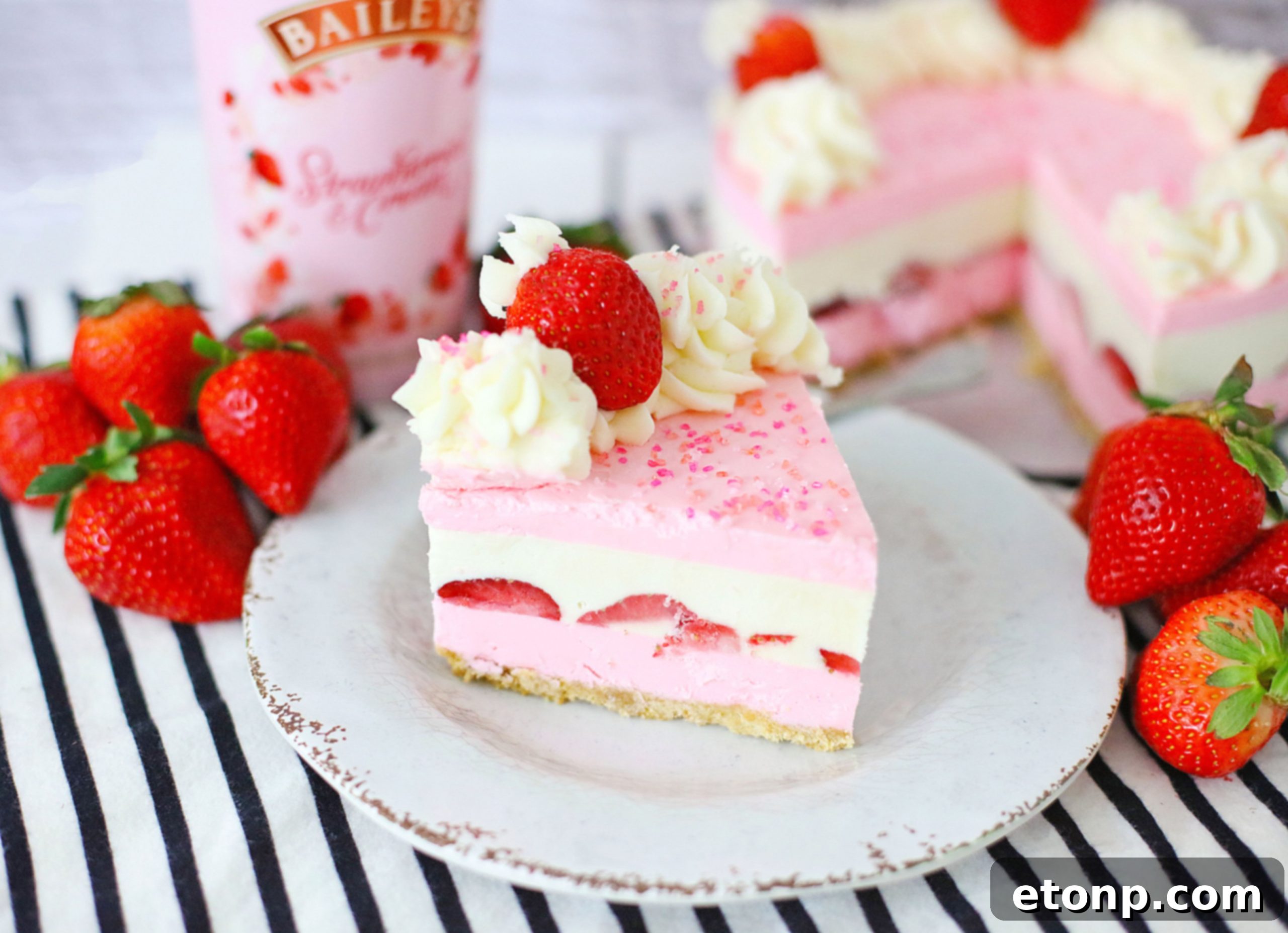 No-Bake Baileys Strawberry Cheesecake Bliss 6 Pouring Baileys Strawberries & Cream into a mixing bowl