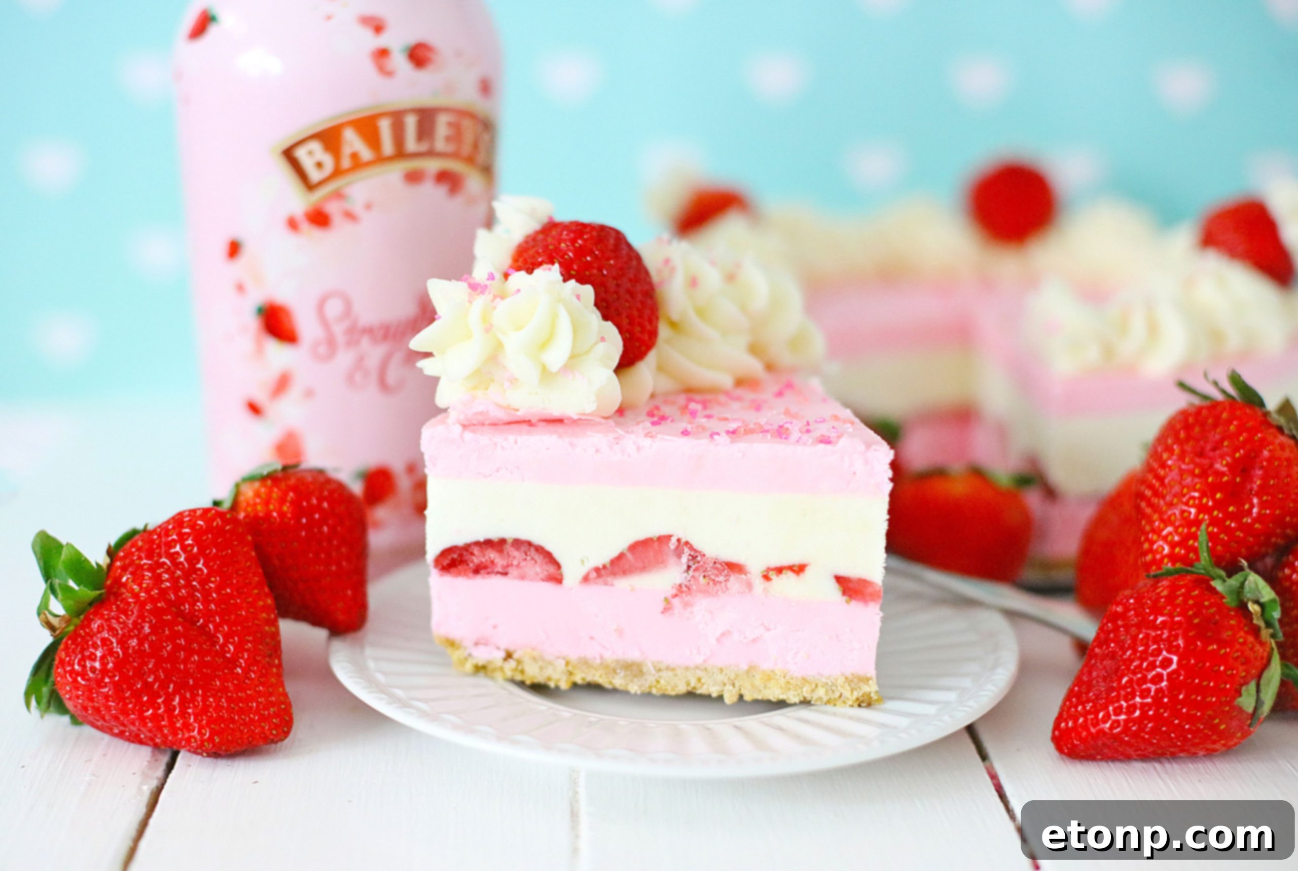 No-Bake Baileys Strawberry Cheesecake Bliss 10 Cheesecake slice with strawberry close up
