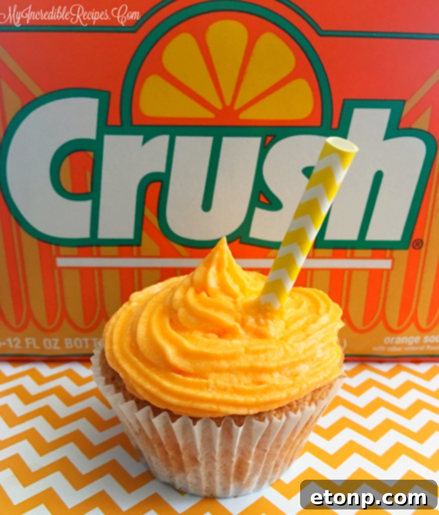 Orange Creamsicle Cupcakes beautifully arranged with fresh orange zest sprinkled generously on top