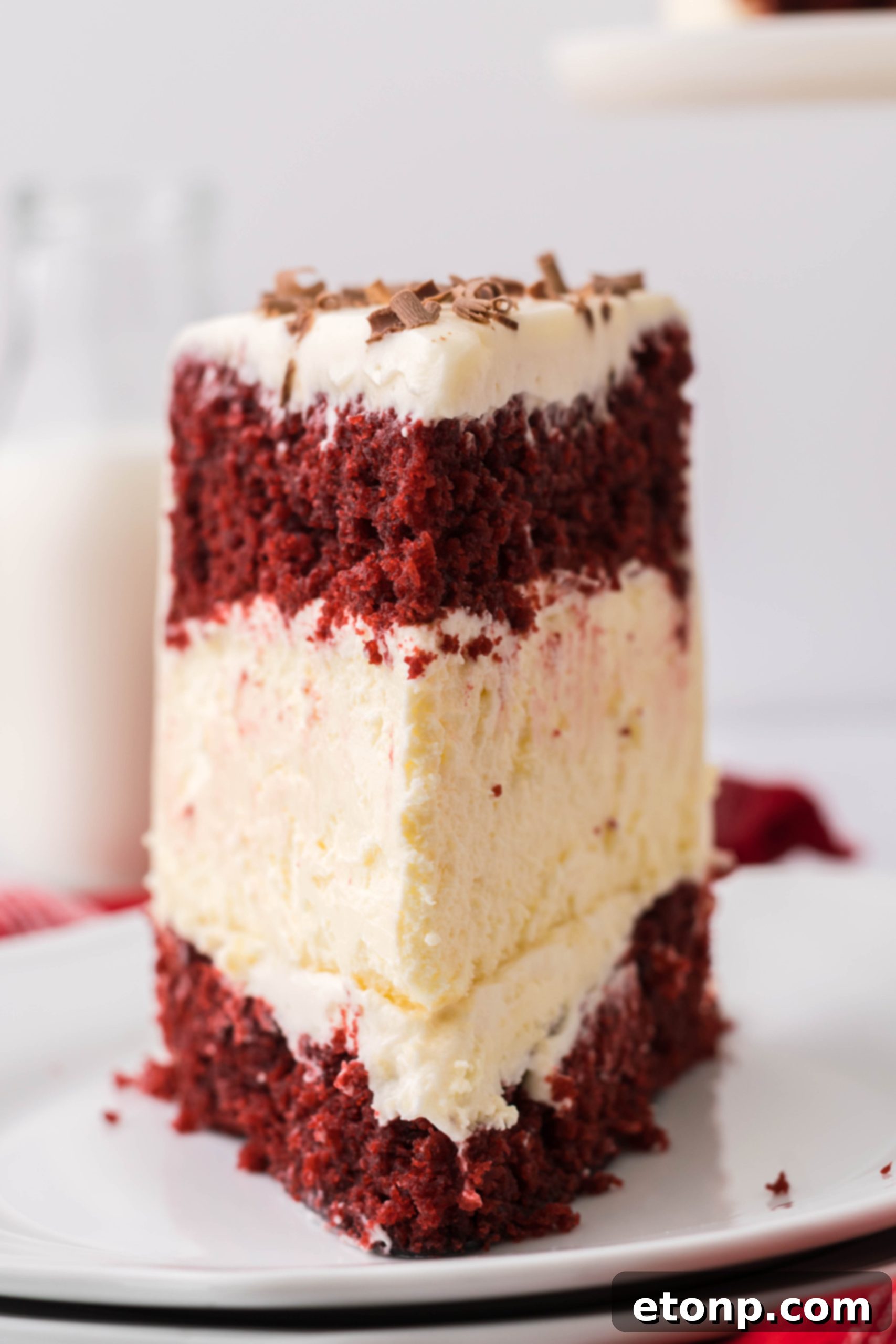 A bowl of red velvet cake batter, showing its vibrant color and smooth consistency.