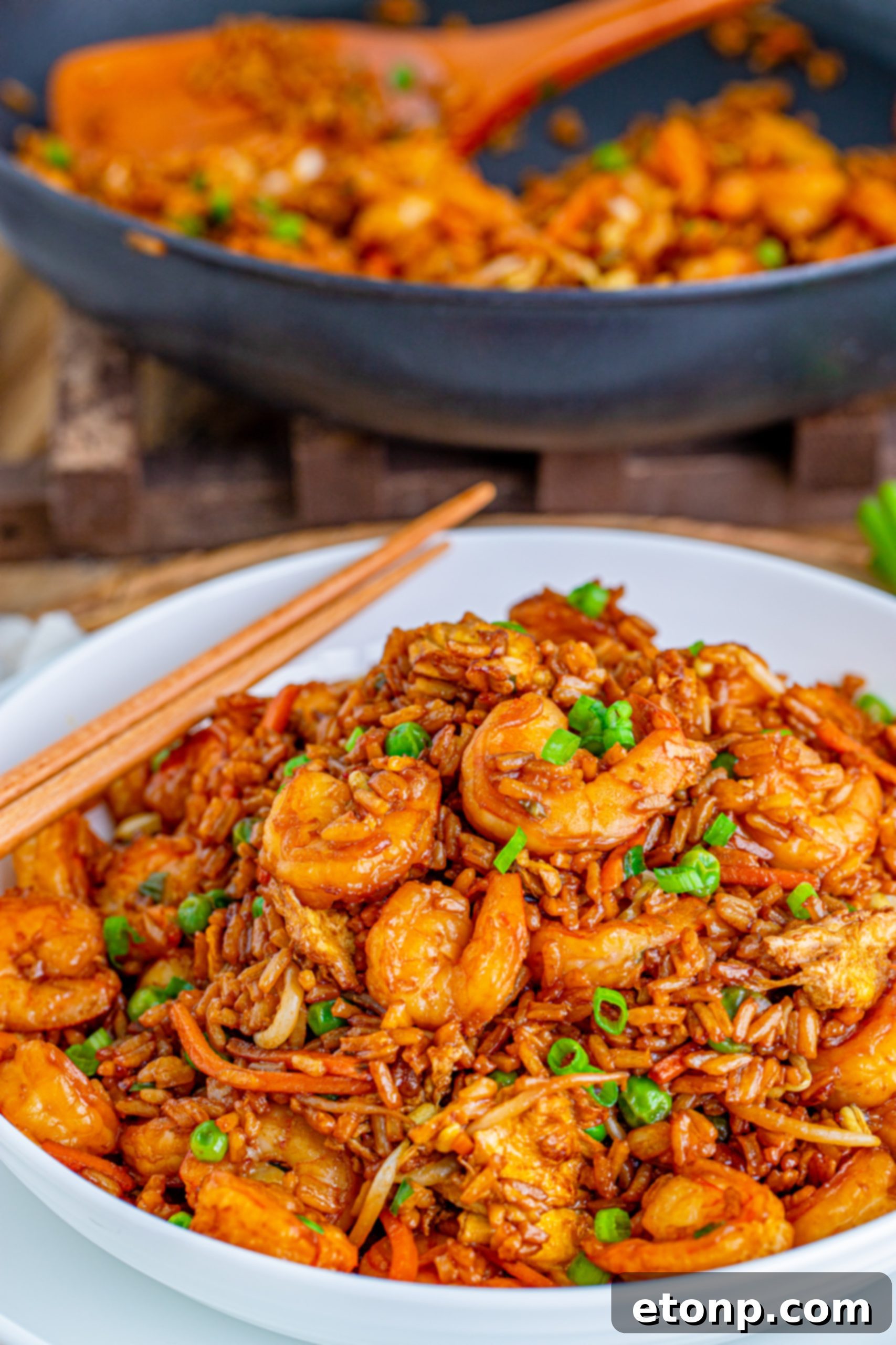 Golden Shrimp Fried Rice 2 Delicious homemade shrimp fried rice served in a bowl, ready to eat.